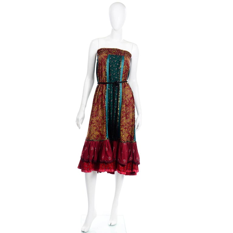 This is a multi patterned colorful vintage strapless dress or skirt that we acquired when we bought a high end fashion  estate from a woman who regularly traveled around the world in the 1970's and 1980's. This skirt was with a quilted jacket