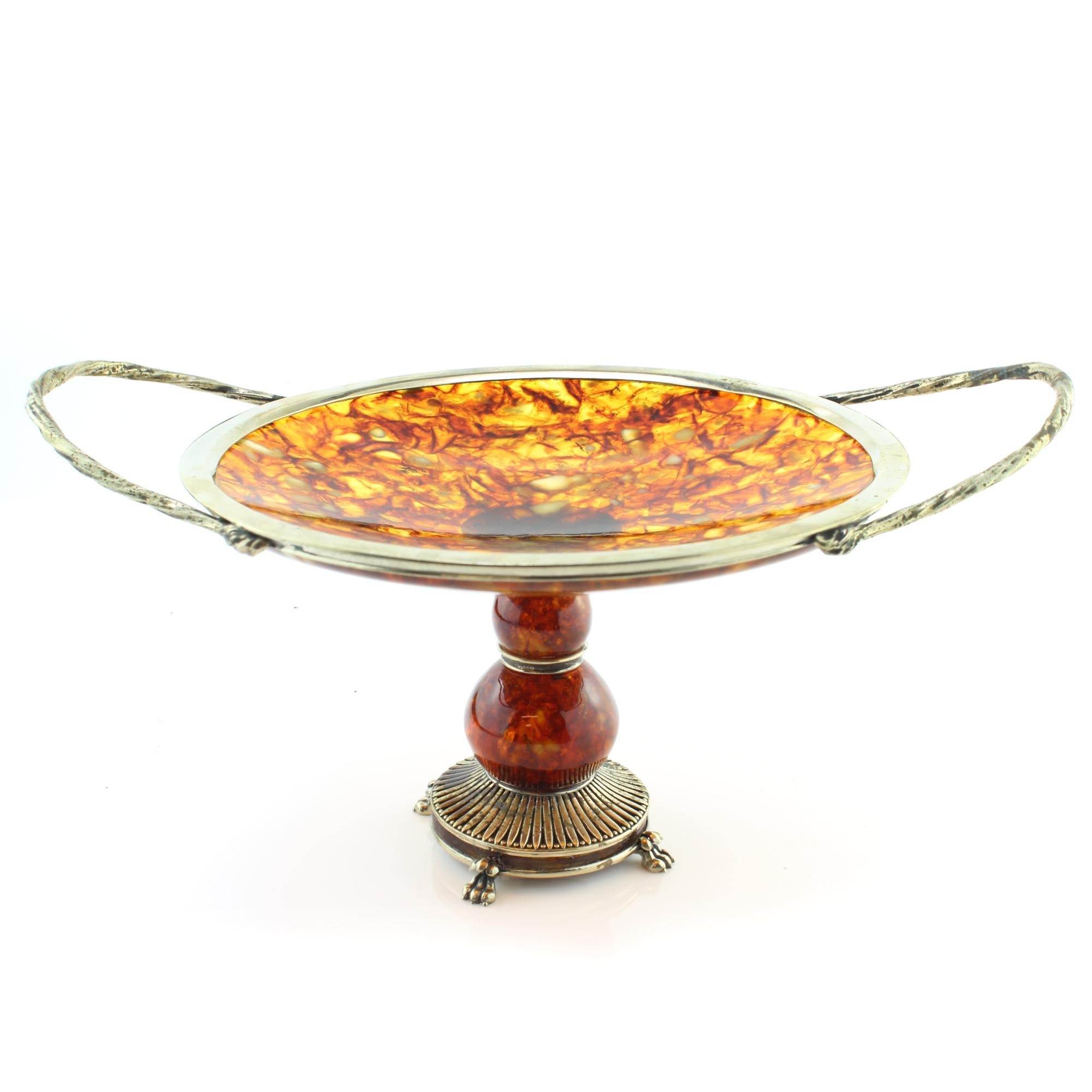 Vintage Russian silver and amber tazza dish
Made in Russia, circa 1990s
Tested positive for 875.silver.
Dimensions:
Size: 23.7 x 16.7 x 12 cm
Weight 357 grams

Condition: Excellent and pleasant overall condition with no damage, please see