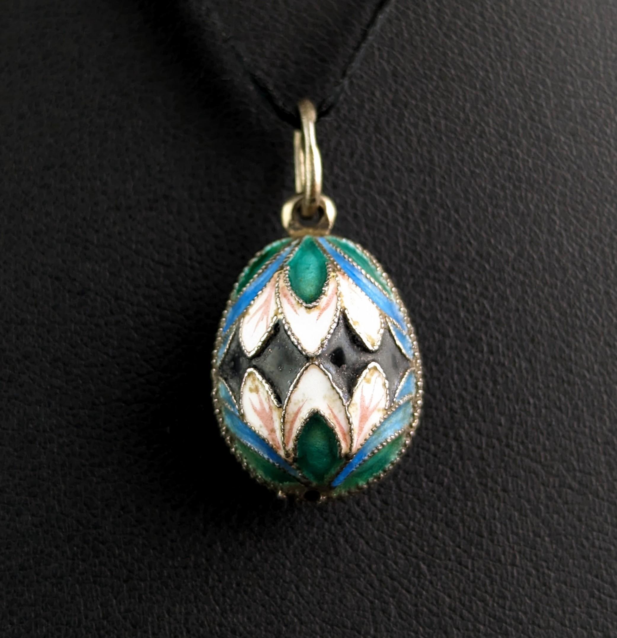 Always highly sought after are these sweet little Easter egg pendants.

Often presented as gifts at Easter time, this sweet little pendant is shaped like an egg, made from 950 silver and enamelled with fine cloisonne enamel in different shades of