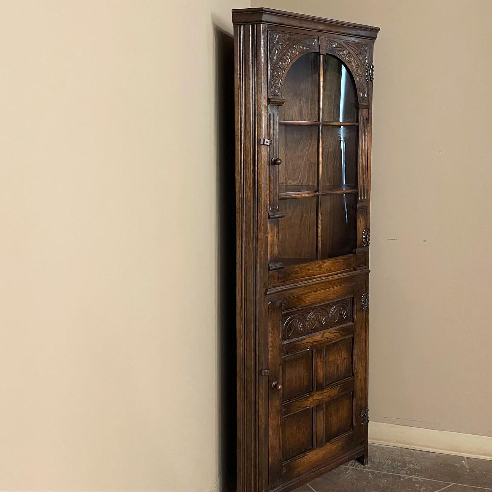 Vintage Rustic English corner cabinet ~ Vitrine is the ideal choice to not only display family heirlooms and keepsakes, but to also utilize an otherwise unused corner of the room! Hand-crafted from solid oak, it features charming carved detail