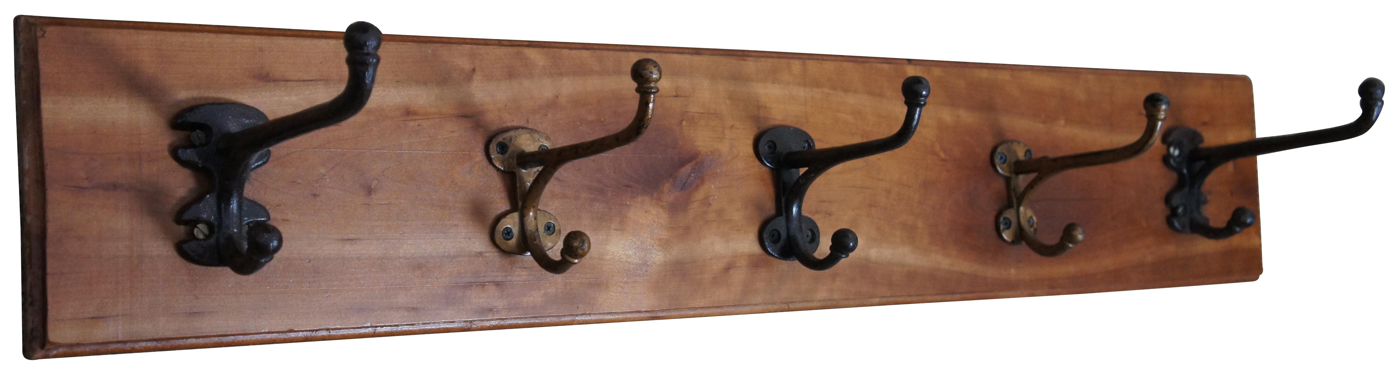 Rustic cherry wood hat / coat / clothing rack / wall tree with five iron hooks. Measure: 45