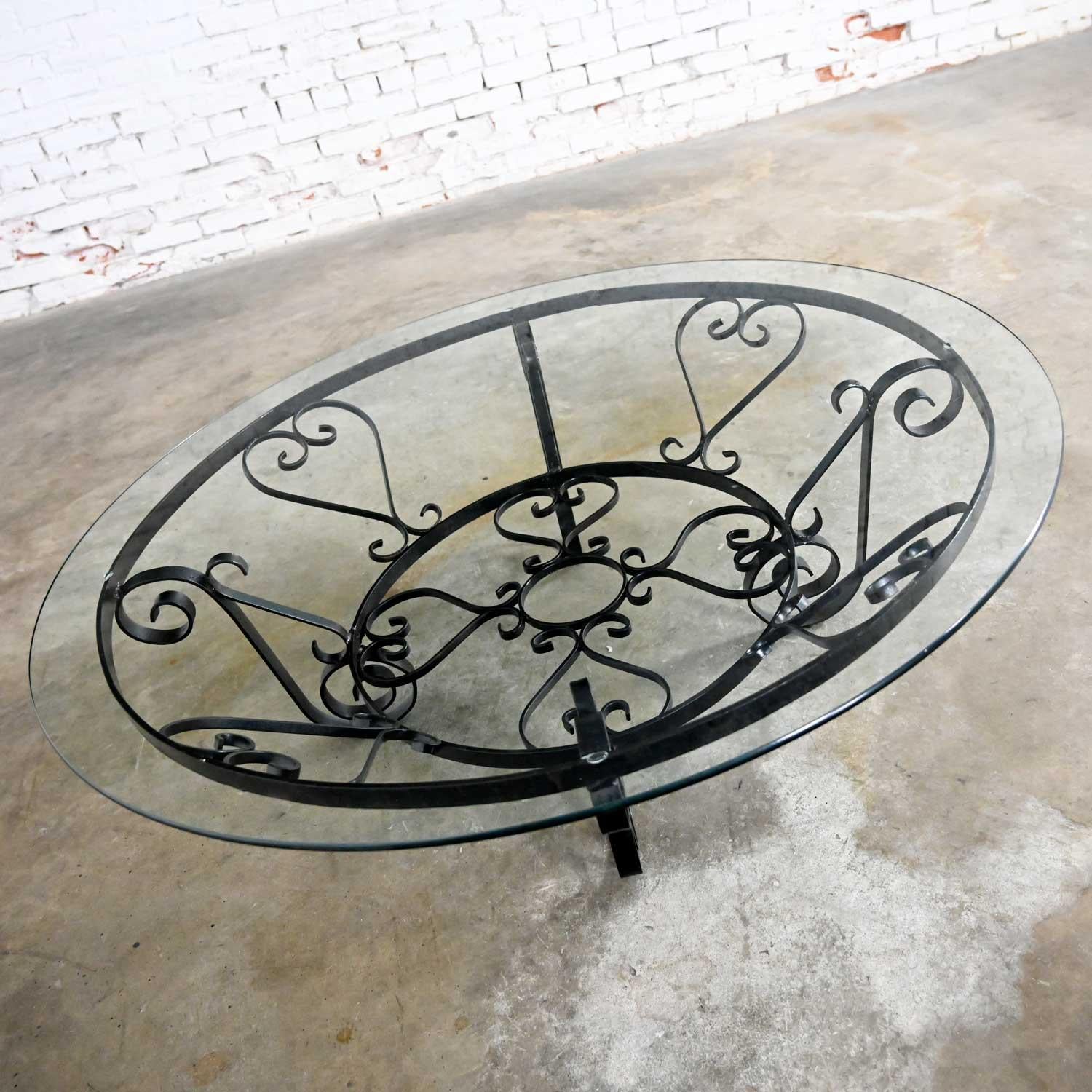20th Century Vintage Rustic Hand Wrought Iron Round Coffee Table with Glass Top For Sale
