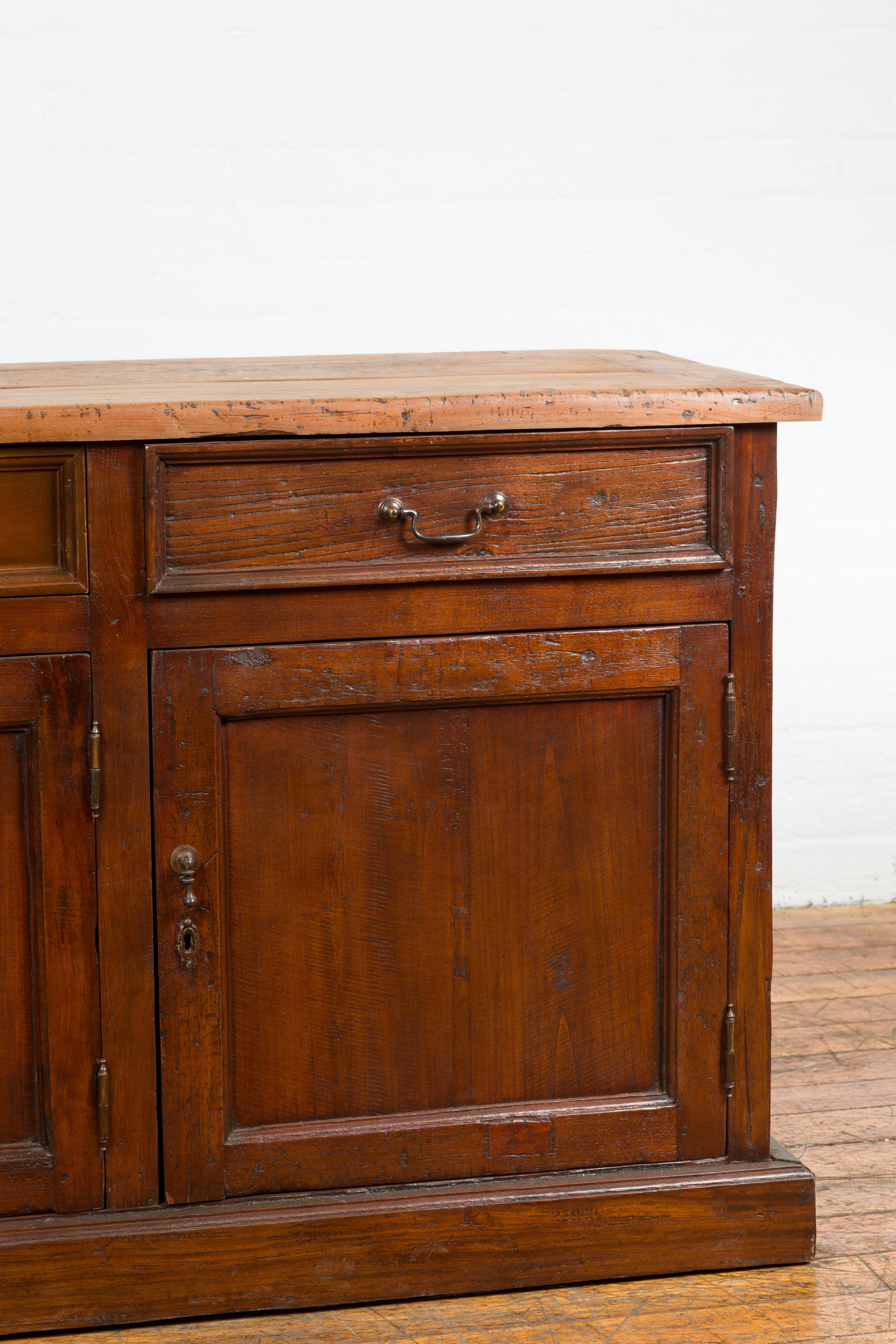 19th Century Vintage Rustic Indonesian Wooden Buffet with Three Drawers over Three Doors For Sale
