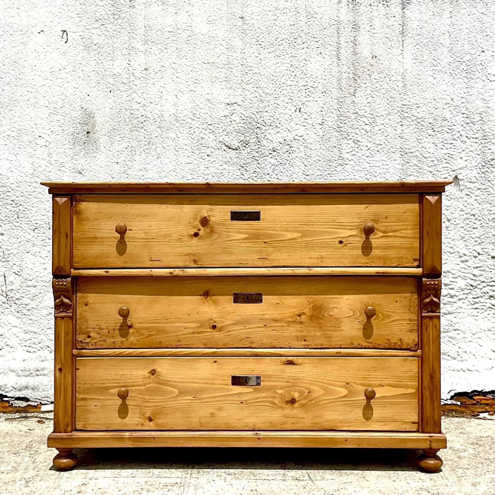 A stunning vintage Rustic chest of drawers. A beautiful simple shape with carved column on the sides. Big and impressive. Perfect as a chest or even as an foyer console. Acquired from a Palm Beach estate.