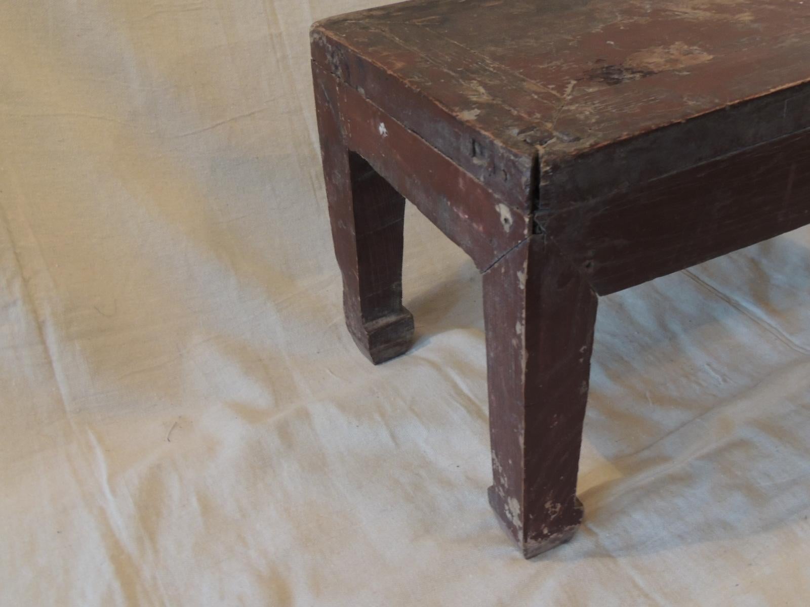 Vintage rustic low Chinese temple altar table.
Sturdy with traces of red lacquer in some places.
Size: 12.75 D x 25.5