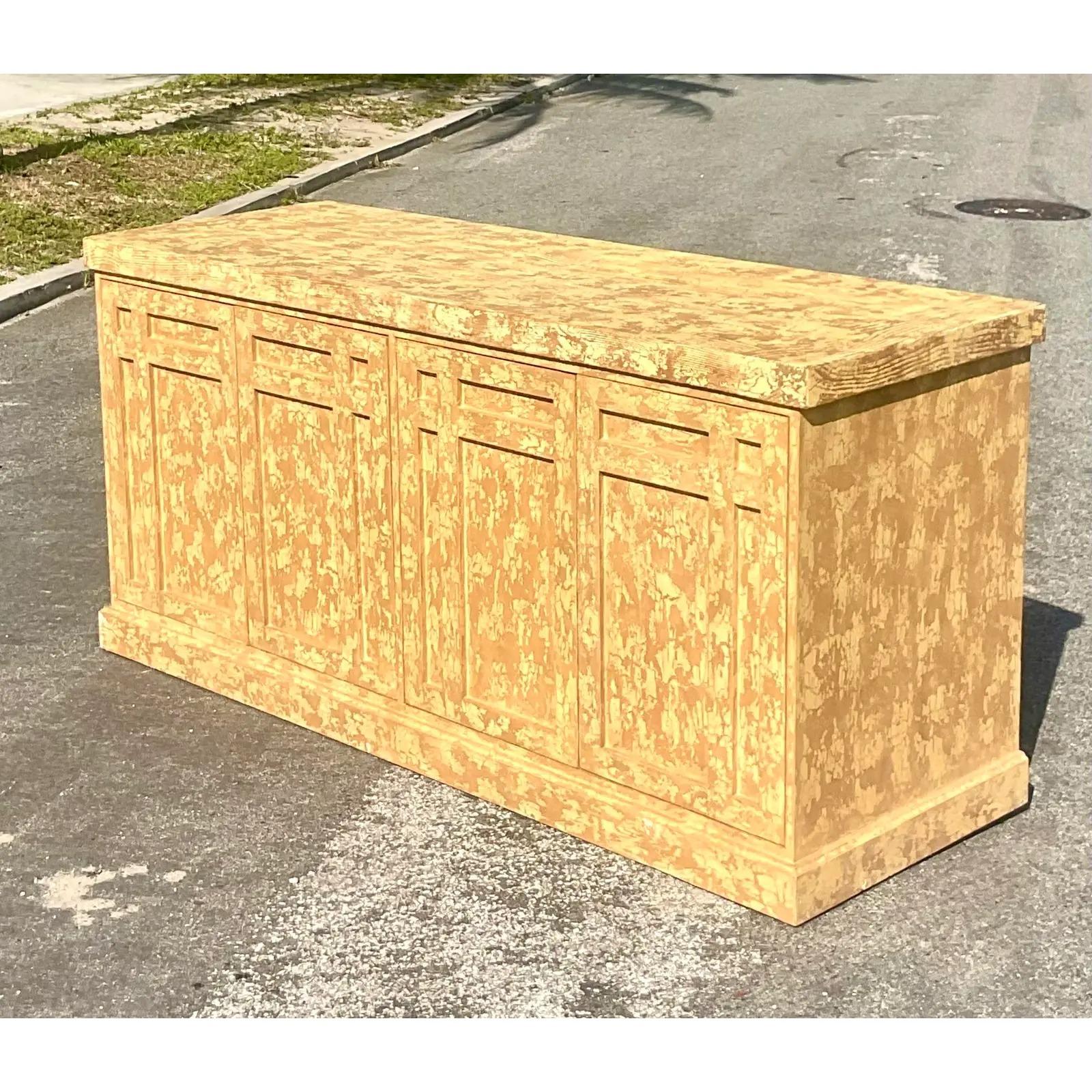 Fantastic vintage rustic credenza. Monumental in size and presence. Distressed finish and beautiful Millwork design. Lots of great storage below. Acquired from a Palm Beach estate.