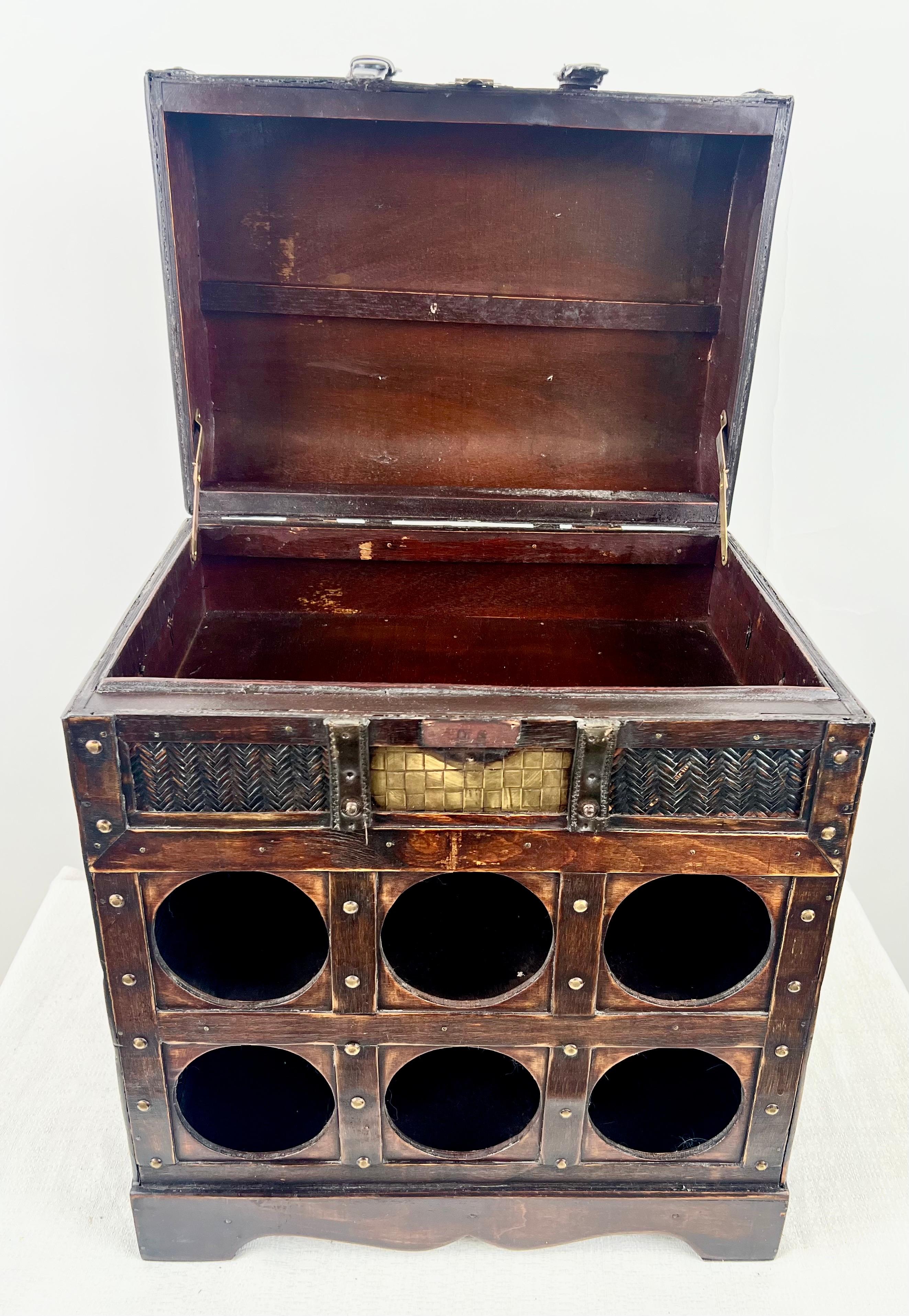 Vintage Rustic Style Treasure Chest Rattan & Wood Portable Wine Rack 

A charming fusion of old-world style and rustic utility, this vintage wine rack is crafted in the form of a treasure chest, exuding character and warmth. Constructed from richly
