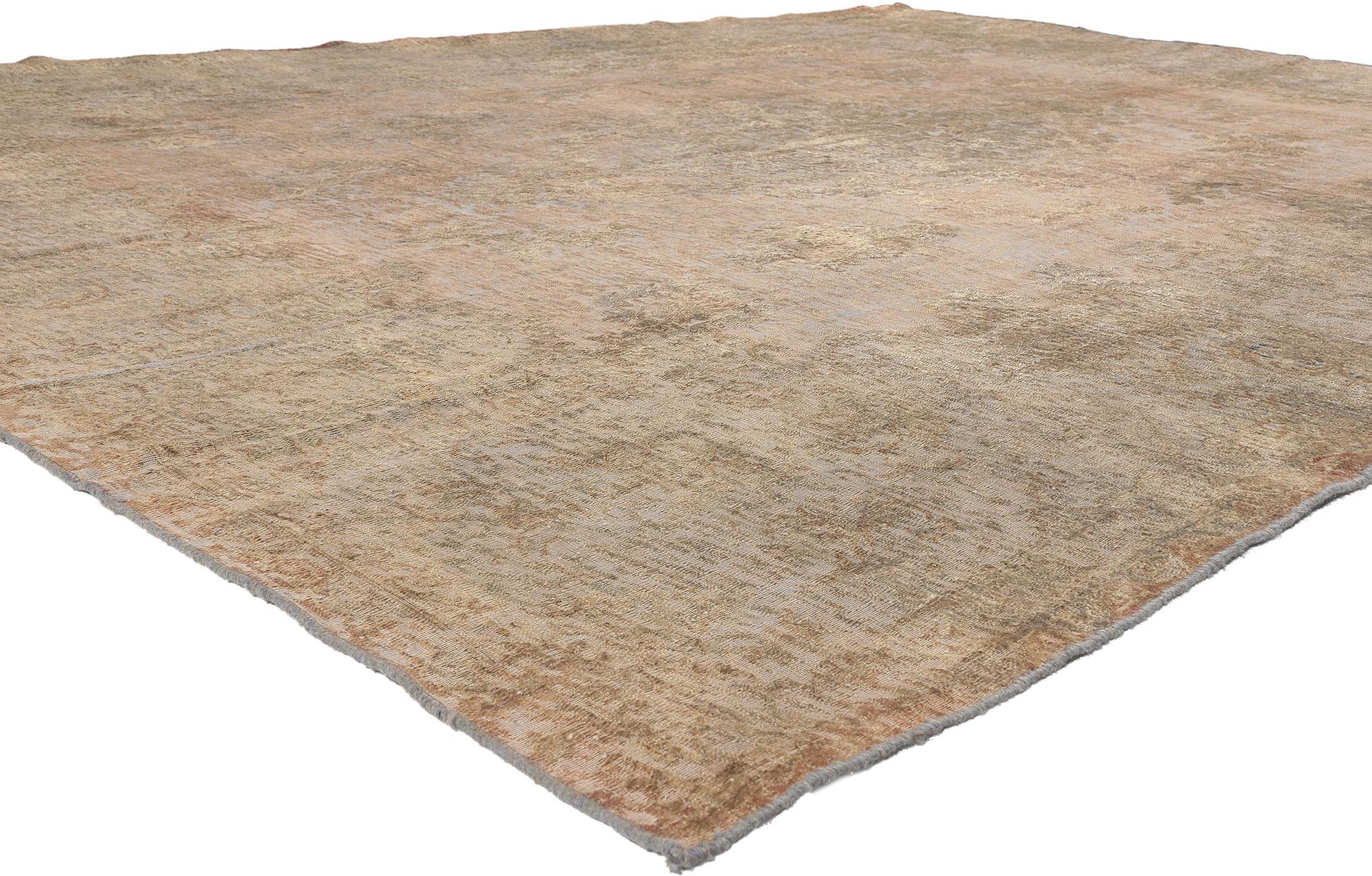 60729 Vintage Turkish Overdyed Rug, 09'03 x 12'08.
Belgian Chic meets French Industrial in this hand knotted wool vintage Turkish overdyed rug. The faded botanical design and neutral earth-tone colors in this piece work together delivering a warm