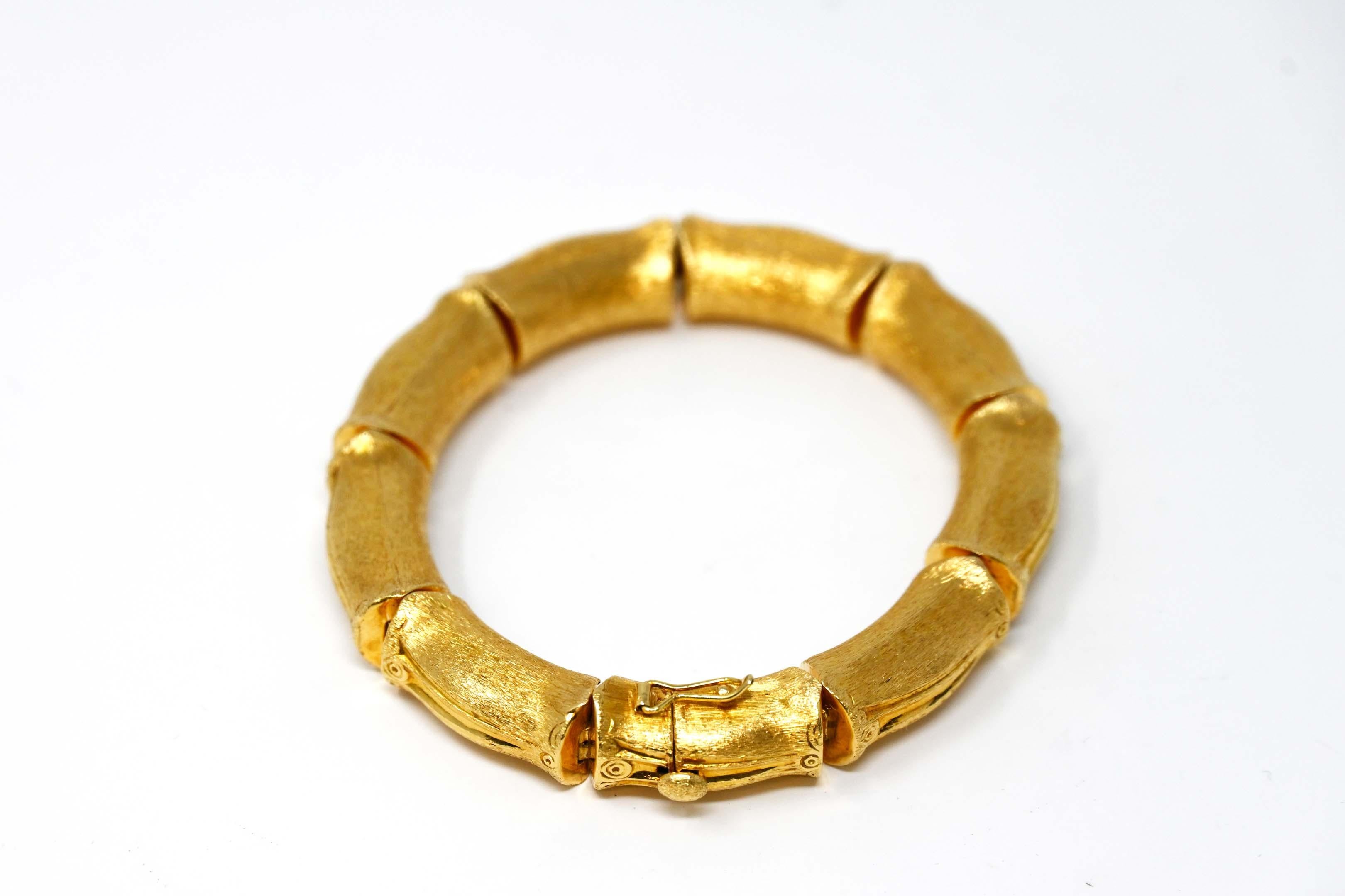 Authentic 18k yellow gold bracelet made by Ruth Satsky, an American famous designer. The bracelet is marked Satsky 18k, Italy. The item measures 8 1/4 inches long and weighs 34.2 grams and comes in excellent condition.