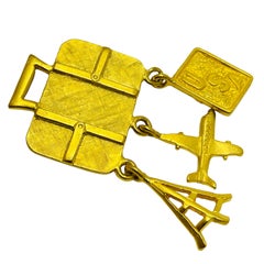 Vintage RVP signed gold tone travel plane luggage USA designer dangle brooch