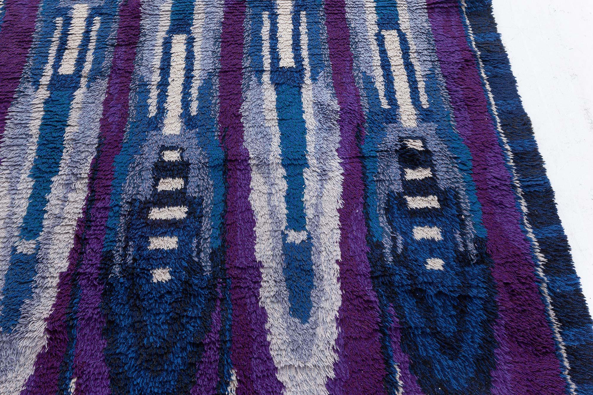 Vintage Rya blue and purple handmade wool rug
Size: 4'7