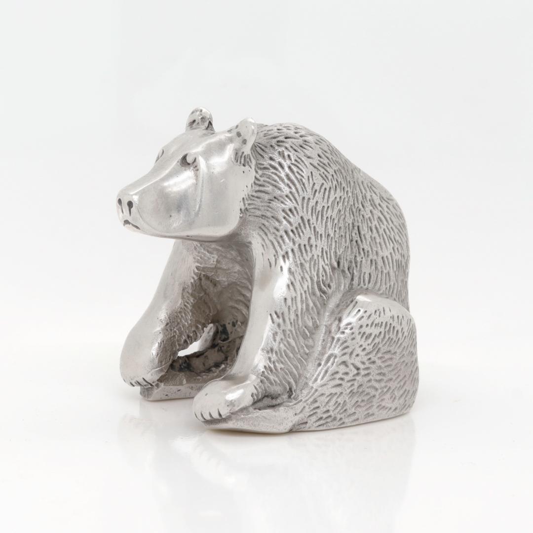 A fine vintage American silver figurine.

By Samuel Kirk & Son.

In sterling silver.

In the form of a seated brown or black bear.

Marked to the base for for S. Kirk & Son / Sterling.

Simply a wonderful diminutive silver figurine!

Date:
20th