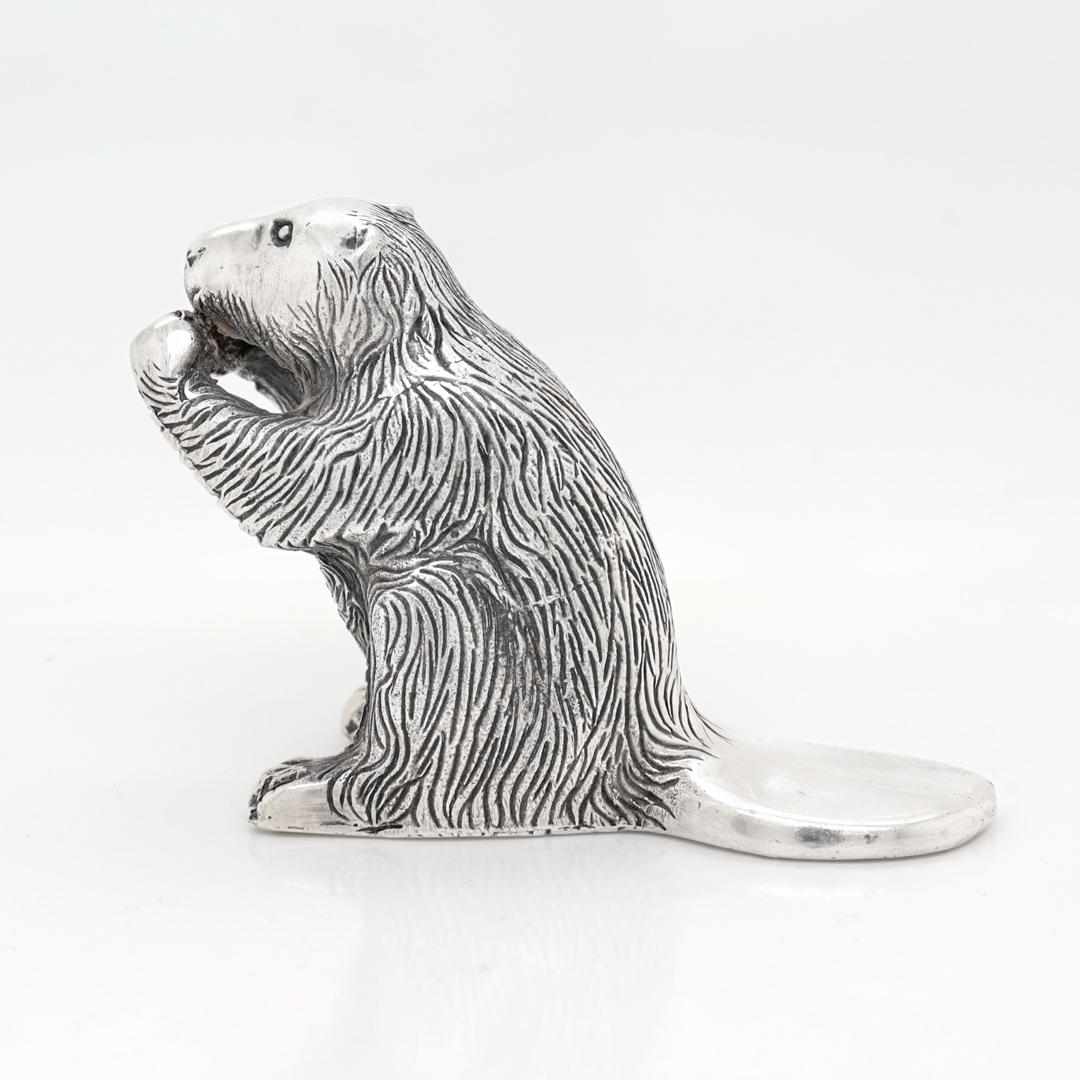 A fine vintage American silver figurine.

By Samuel Kirk & Son.

In sterling silver.

In the form of a seated beaver (who appears to be chewing).

Marked to the base for for S. Kirk & Son / Sterling.

Simply a wonderful silver figurine!

Date:
20th
