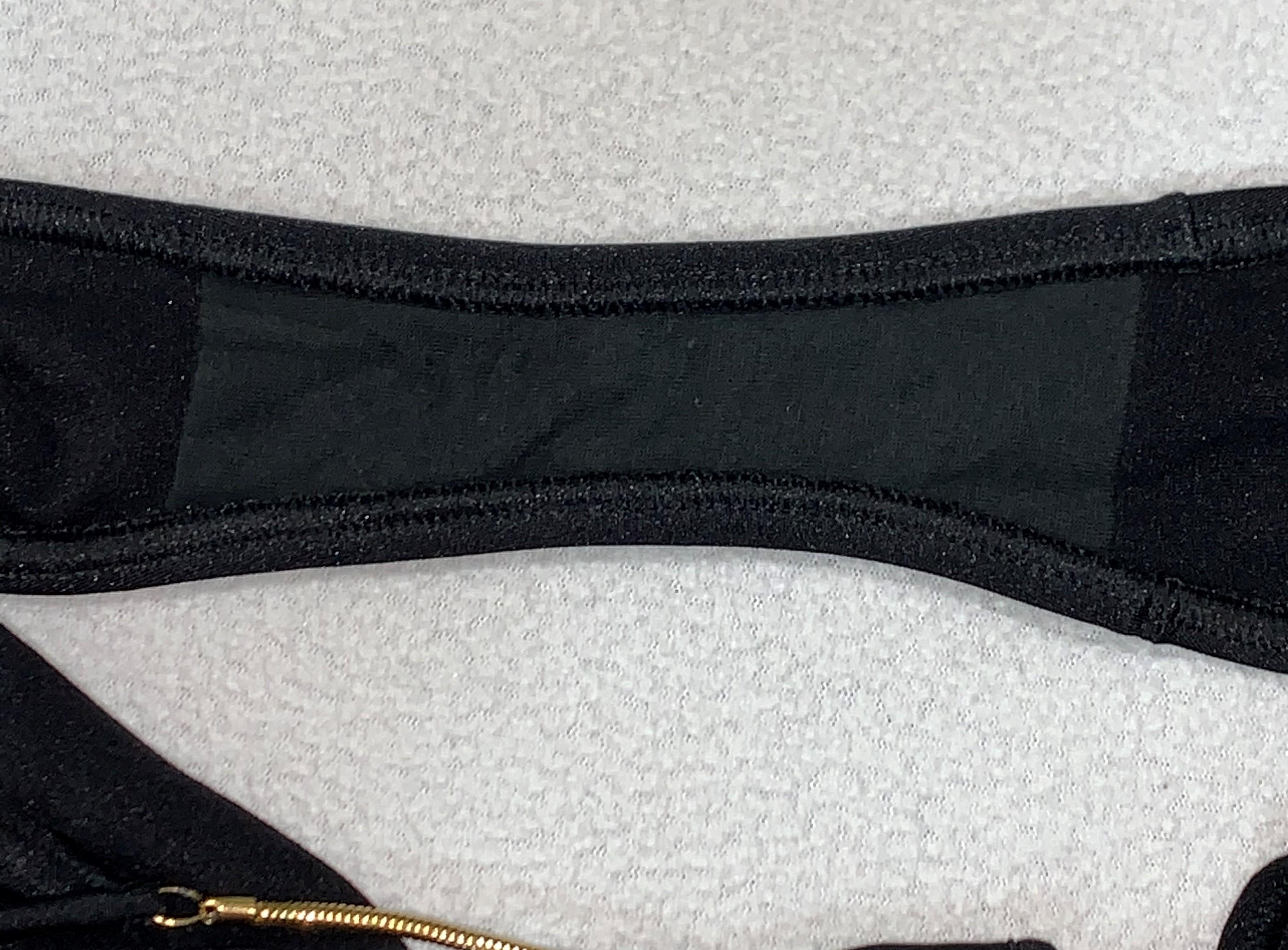 black swimsuit with gold chain