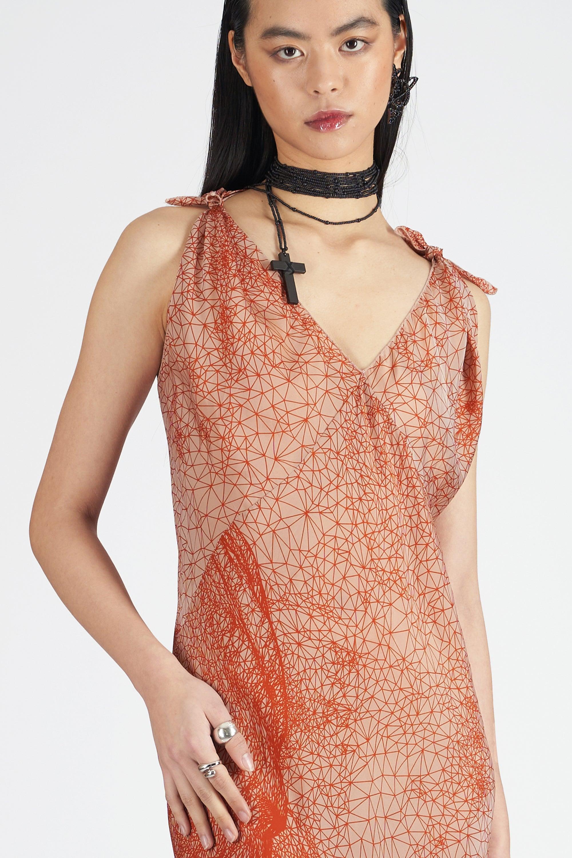 Jean Paul Gaultier Spring Summer 2001 ‘Constellation’ silk sleeveless dress. Features v-neckline, tie shoulder detail and maxi length. In excellent vintage condition.
Brand: Jean Paul Gaultier
Size: UK 8
Color: Multi
Label size: N/A
Modern size: UK: