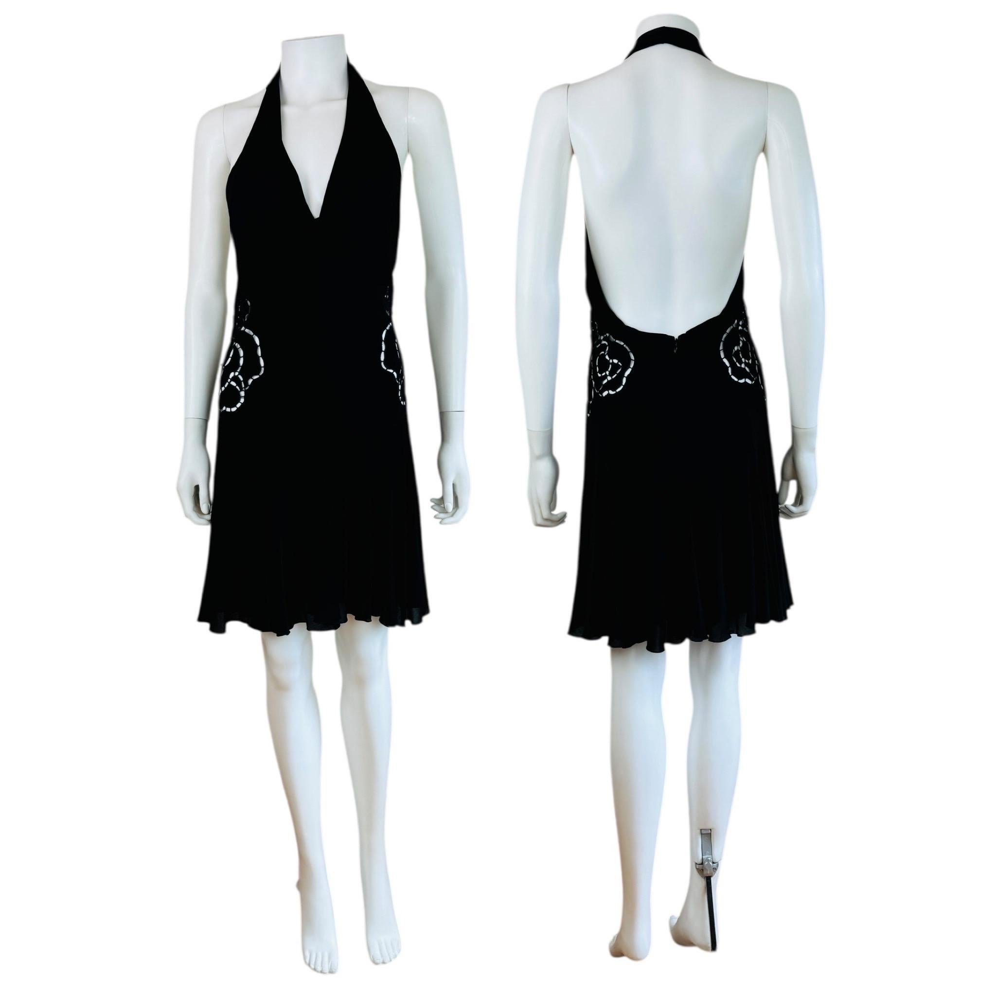 Vintage S/S 2002 Roberto Cavalli Dress
Seen on the runway
Black viscose + elastic fabric
Halter neckline with draped detail at the front
Cut out details on the bodice at each hip
Fitted style with double layer flared hemline
Low cut back
Hidden