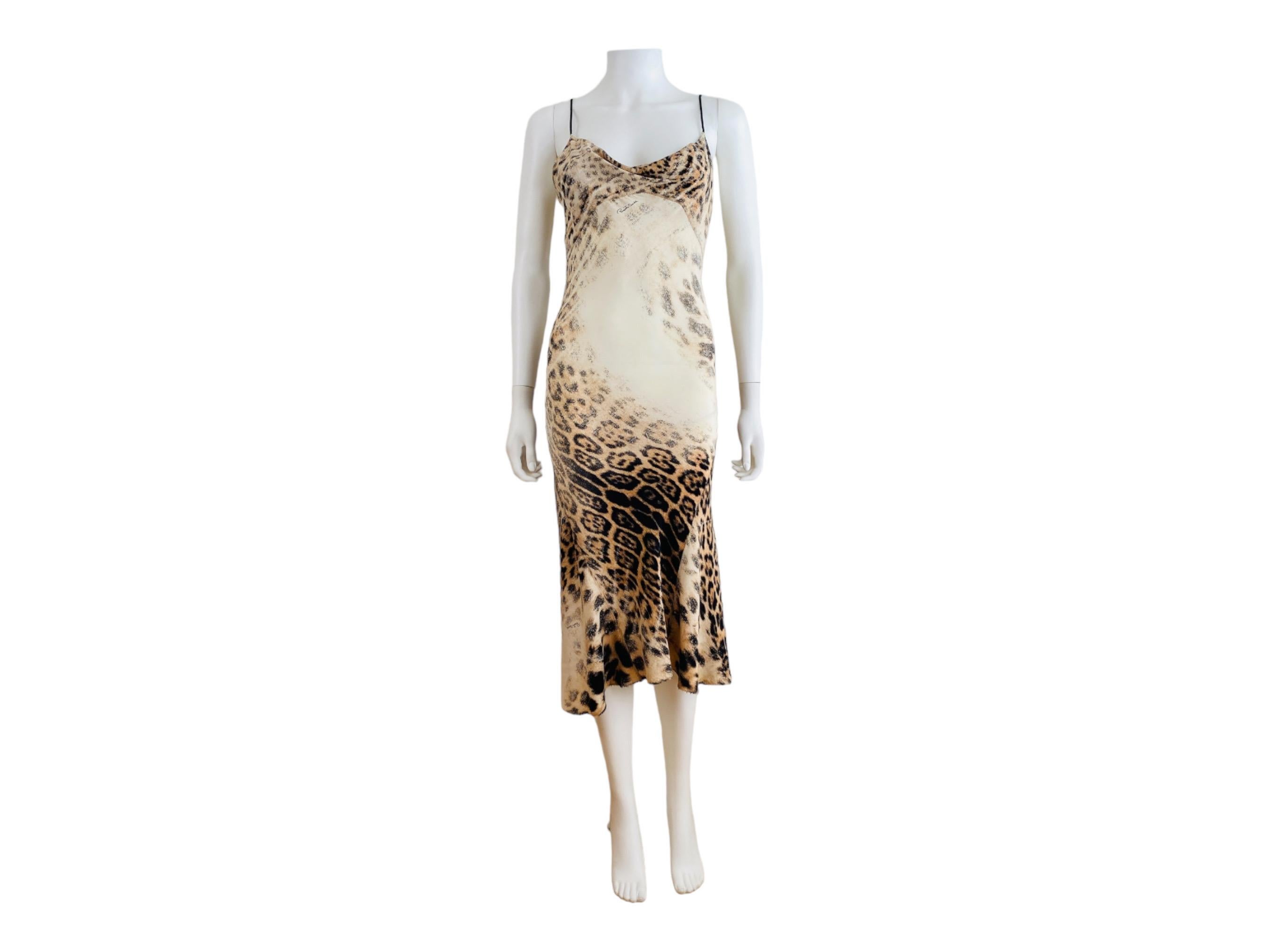 S/S 2002 Roberto Cavalli Dress
Leopard animal print on silk
Draped neckline
Brown braided shoulder straps
Slip style
Midi length
Low scooped upper back
Braided corset detail up the back with copper snake head + tail finials
Slips on overhead
Lined