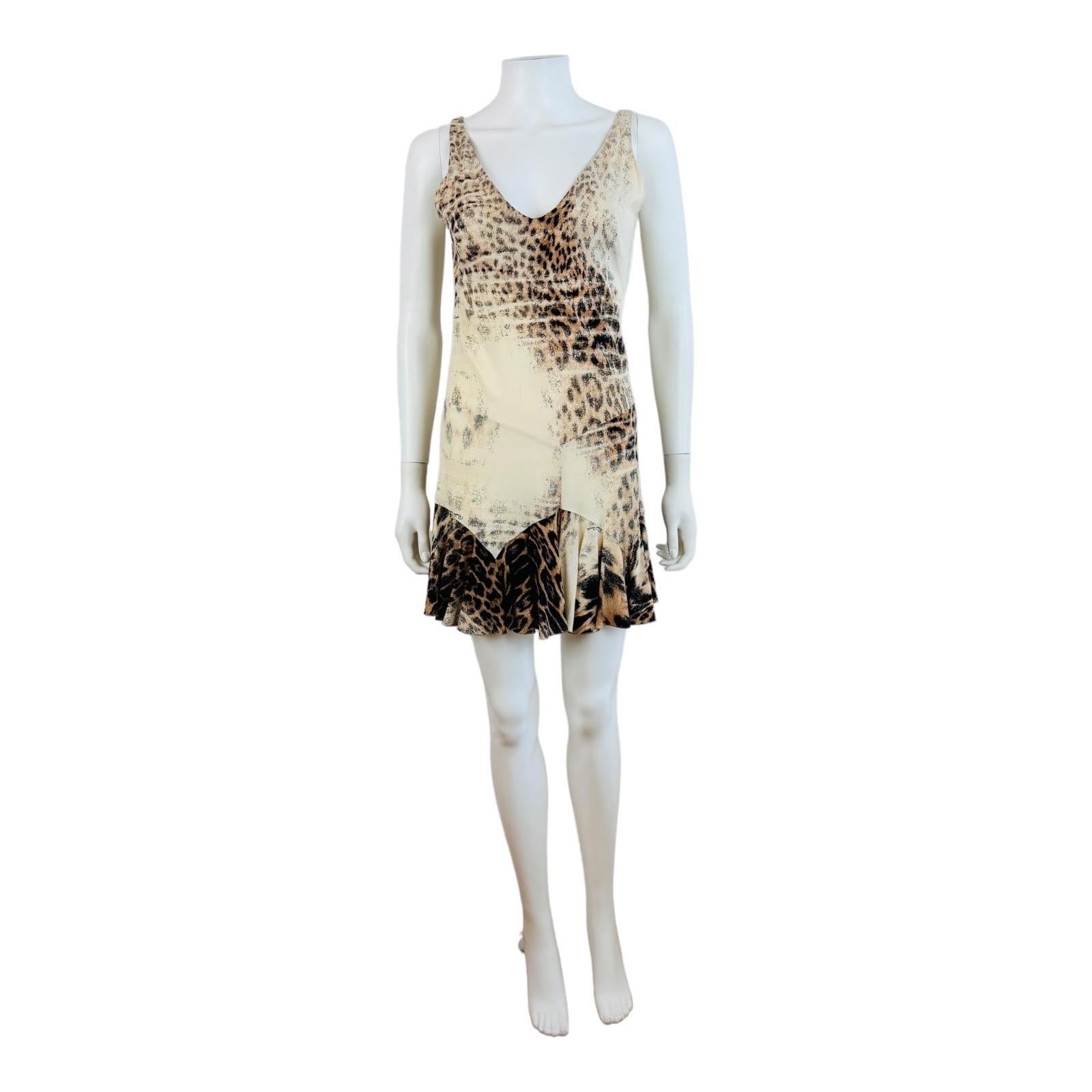 Vintage S/S 2002 Roberto Cavalli Dress
Leopard animal print on cream stretch silk
V neckline
Sleeveless
Slip style
Mini length
Ruffled hemline
Slips on overhead
Unlined

Marked S, Measurements - Bust 16-17