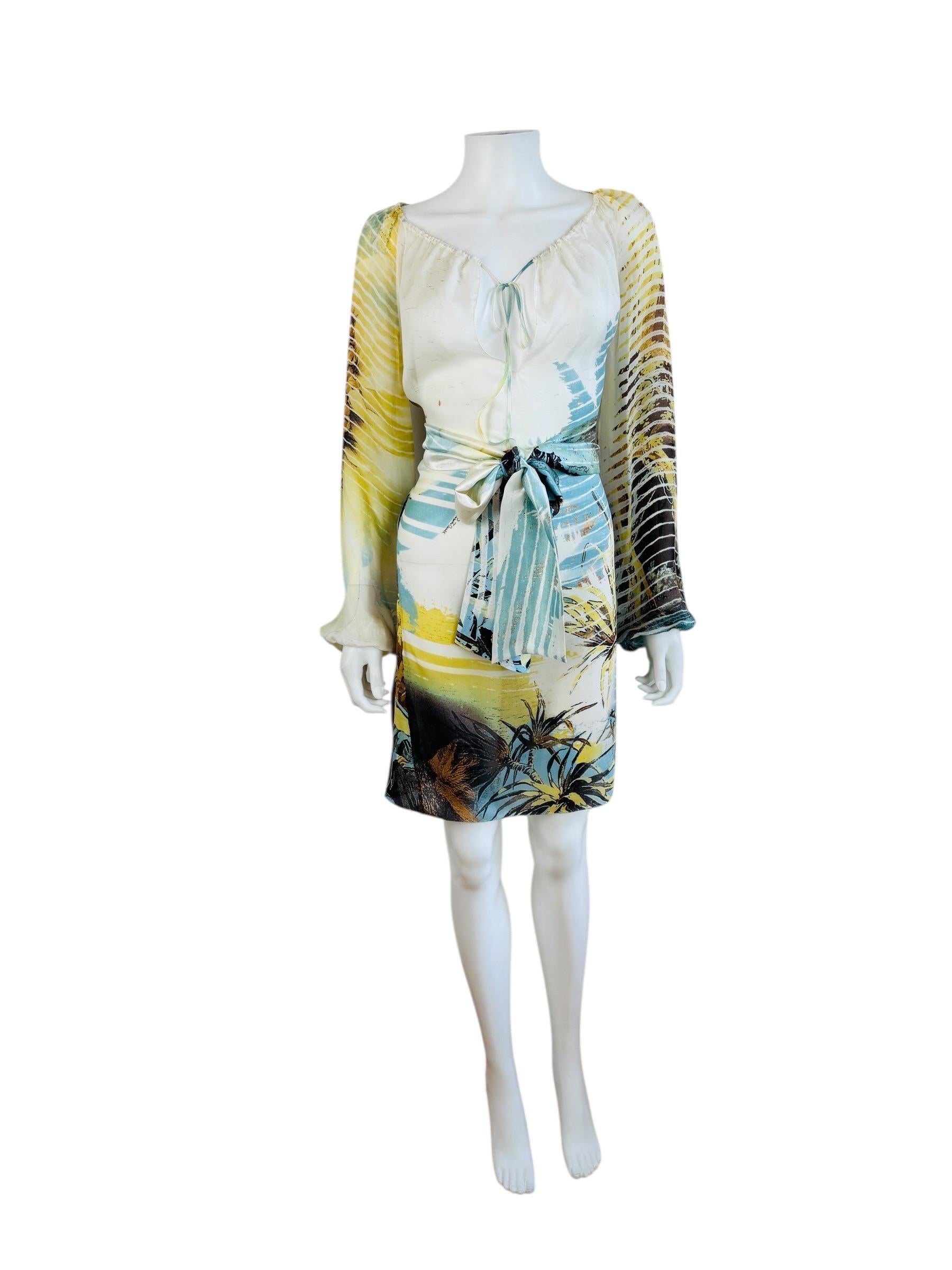 S/S 200s2 2000s Roberto Cavalli Dress 
Oversized lion print on semi sheer chiffon silk fabric
Elastic neckline can be worn many ways but is meant to be tied at the front
Loose flowy fit with wide attached matching silk satin fabric belt can also be