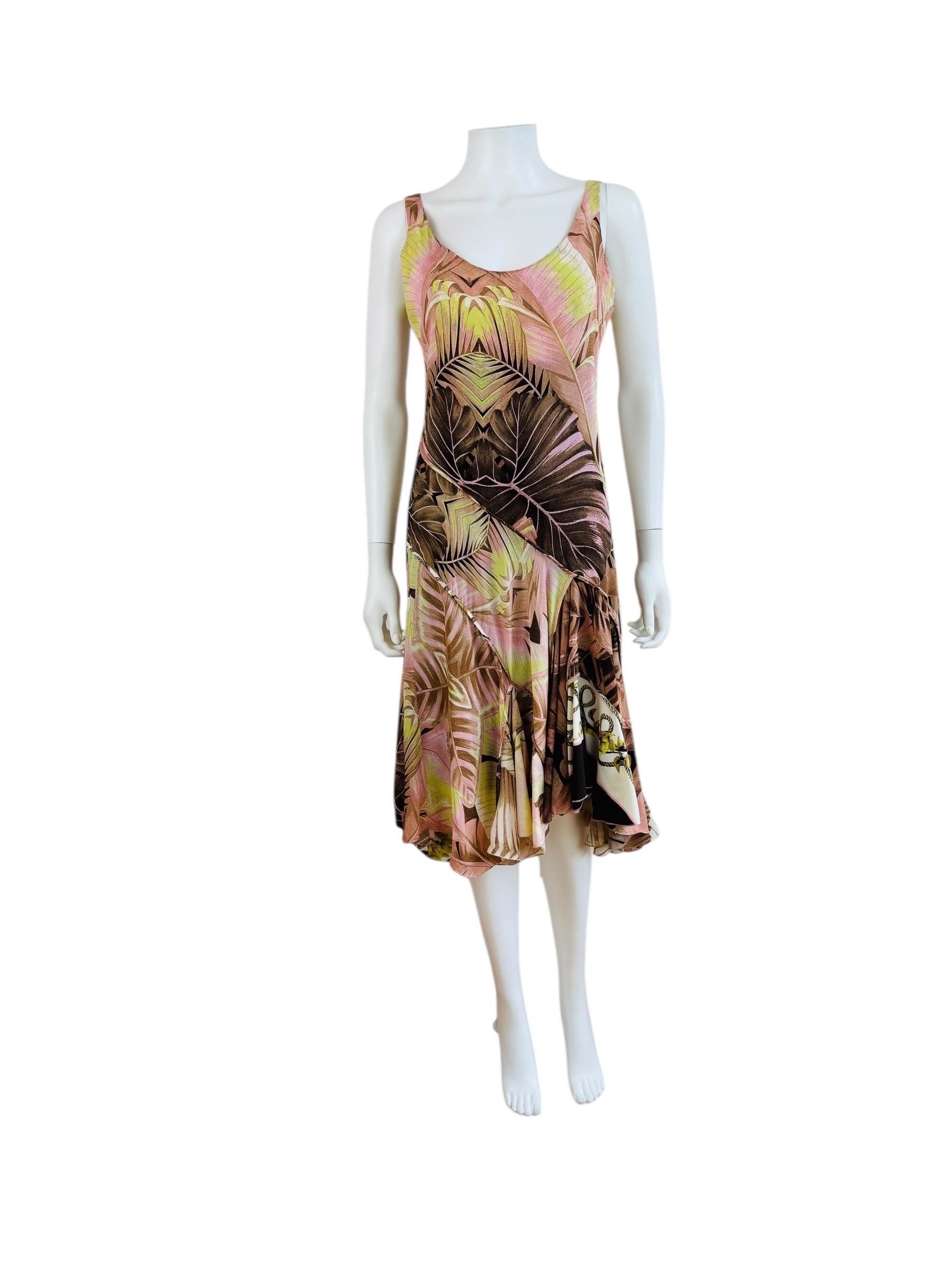 S/S 2003 Roberto Cavalli Dress
Silk + elastic palm print dress with contrasting orchid + rope print fabric at the hemline
Scooped neckline
Wide shoulder straps
Fit + flare style with asymmetrical hemline
V neckline at back
Slips on overhead
Lined at