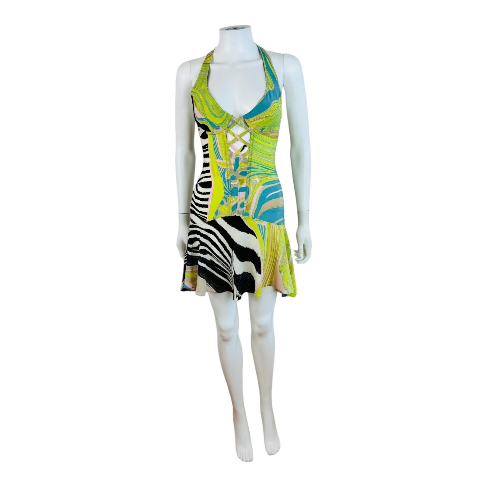 Vintage S/S 2004 Roberto Cavalli Dress
Abstract geometric + zebra print fabric silk fabric with metallic gold painted accents
Halter neckline
Plunging neckline with lace up detail at the bust
Boned bodice + underwire bust
Drop waist
Flounce mini