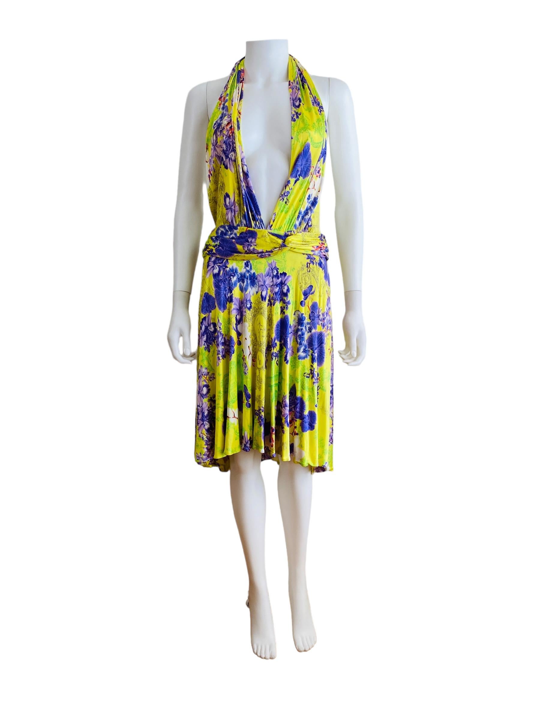 S/S 2004 Versace Dress
Bold + bright slinky neon yellow fabric with oversized toile + purple orchid floral print
Halter style deep plunging neckline w/full coverage fabric on the bust if so desired, fabric can be gathered or not on the bust
Fitted