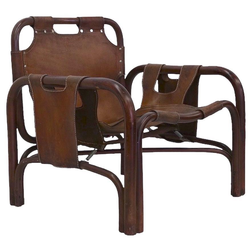 Vintage Safari Armchair in Rattan and Leather by Tito Agnoli for Bonacina 1960s For Sale