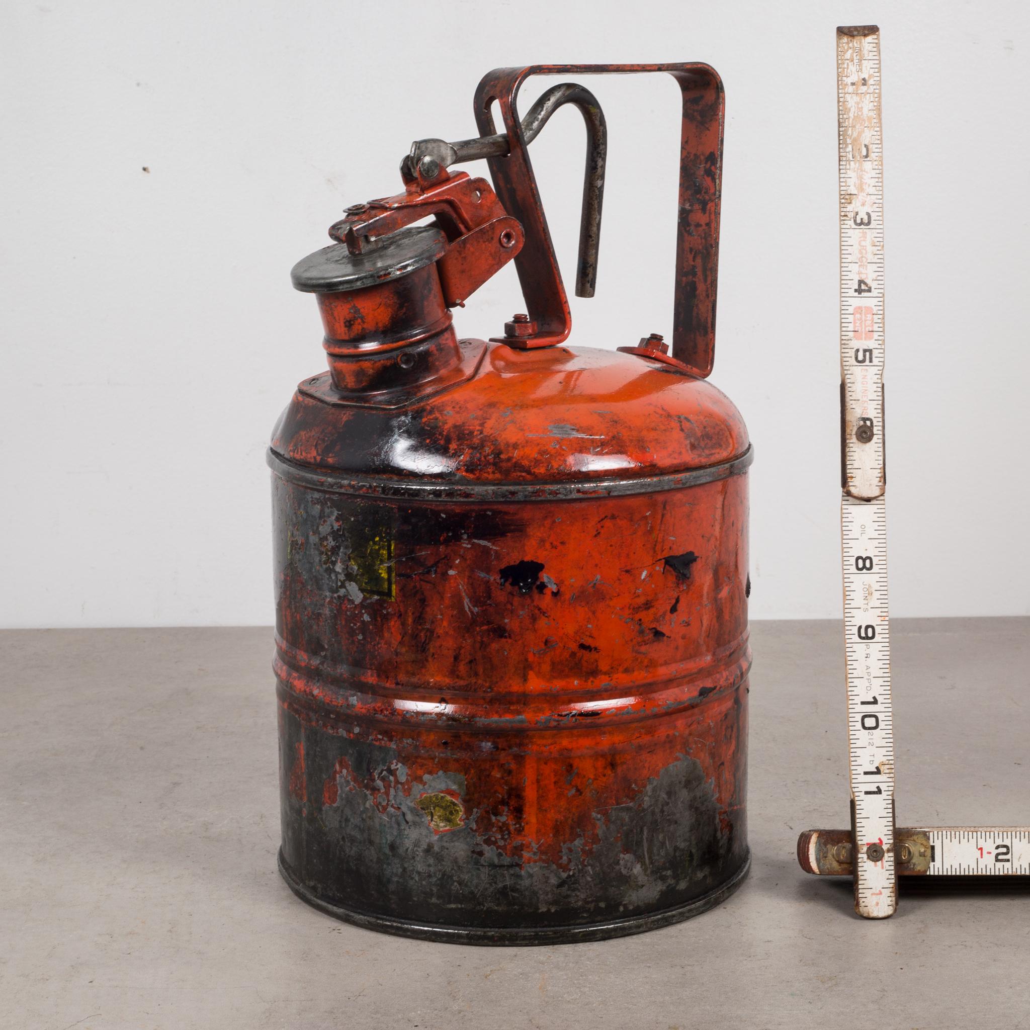 About:

Vintage red metal safety gas cans with handle grip that opens the can. Shellacked to preserve the paint and for a clean finish.

Creator: Underwriter's Laboratories Inc.
Date of manufacture: circa 1940-1950.
Materials and techniques:
