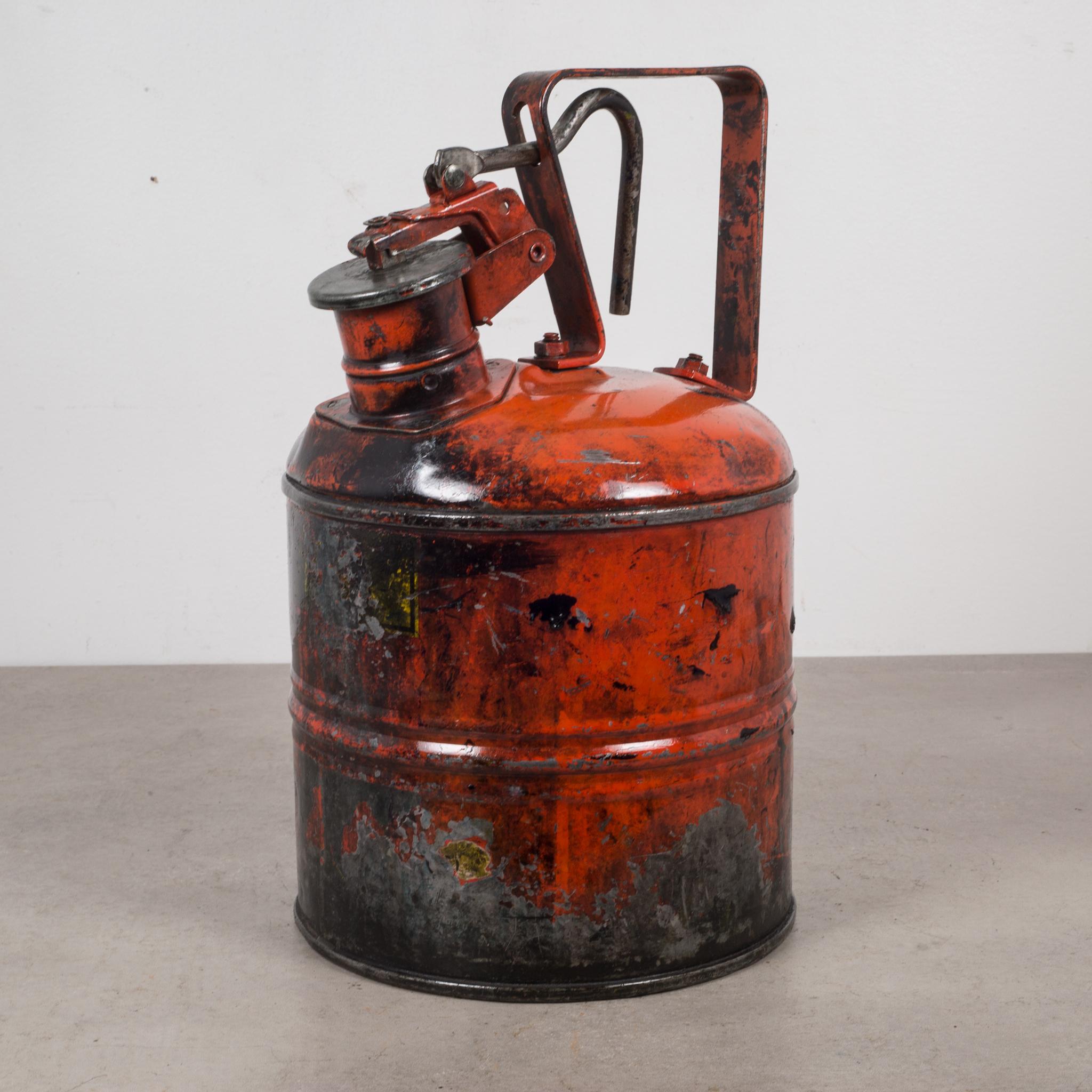 About:

Vintage red metal safety gas cans with handle grip that opens the can. Shellacked to preserve the paint and for a clean finish.

Creator: Underwriter's Laboratories Inc.
Date of manufacture: circa 1940-1950.
Materials and techniques: Metal,