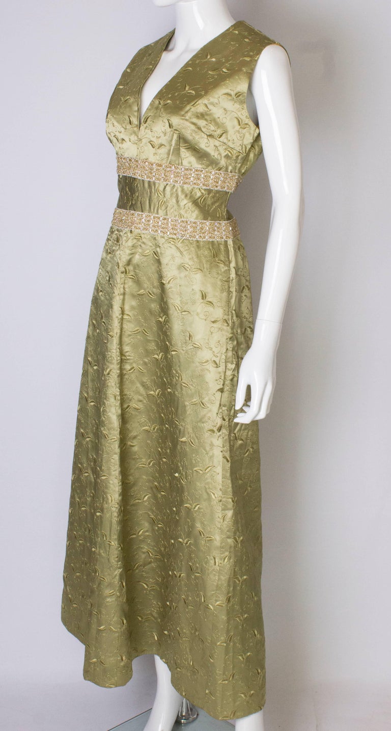 A Vintage 1960s Sage Green embroidered evening Gown For Sale at 1stDibs
