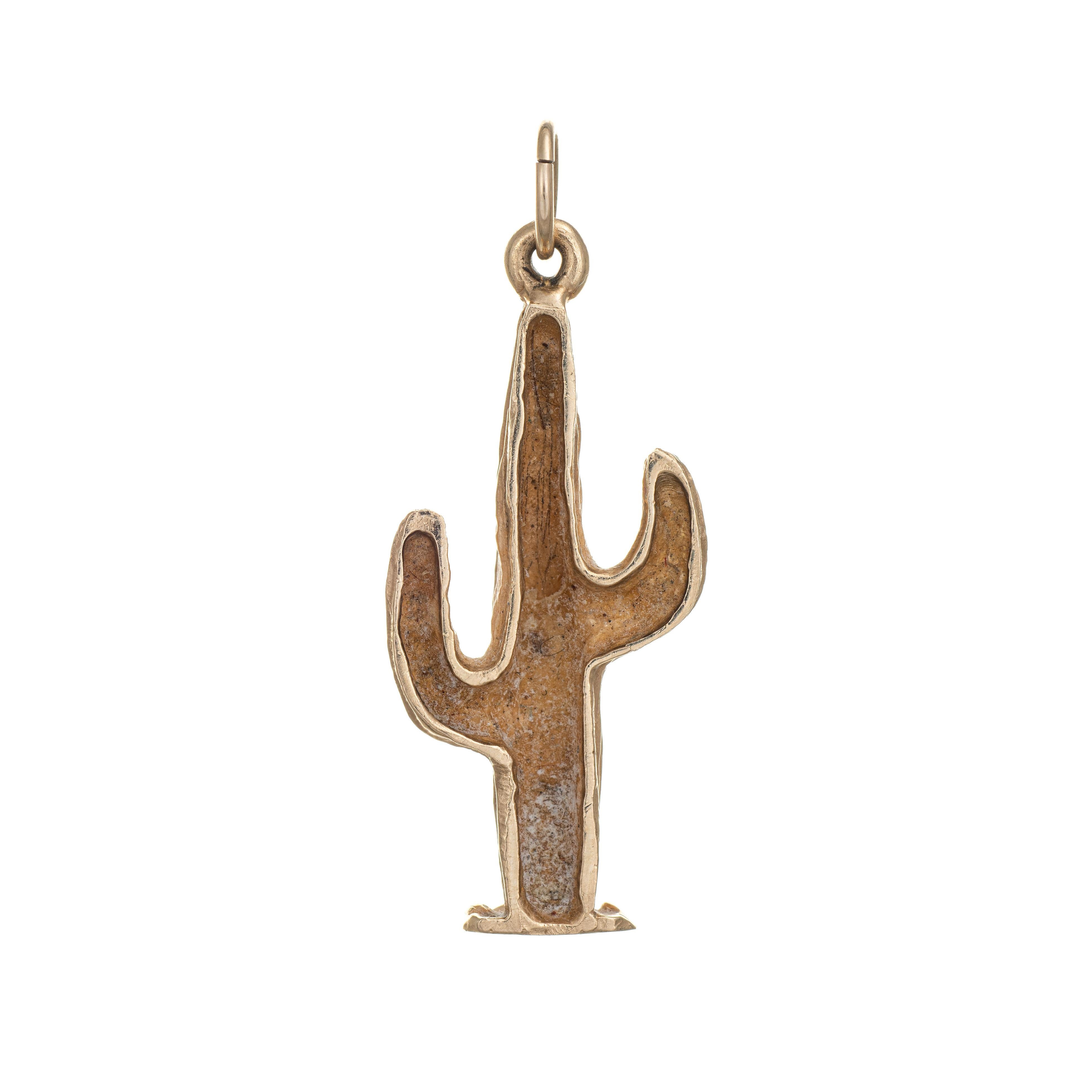 Finely detailed vintage Cactus charm crafted in 14k yellow gold.  

The saguaro cactus features a ridged design for a lifelike look. The piece can be worn as a charm on a bracelet or as a pendant.

The charm is in very good condition. We have not