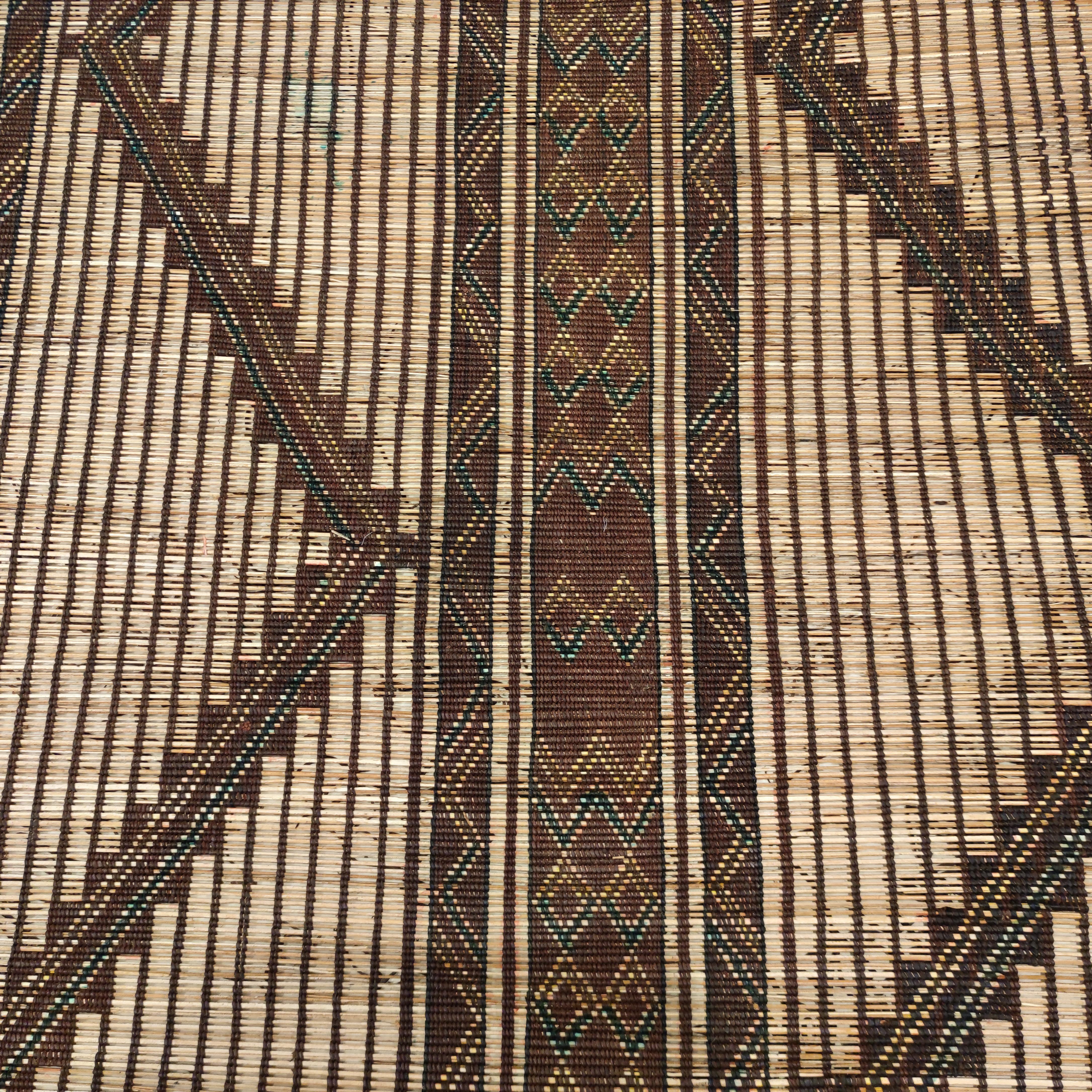 The carpets of the Tuareg, who are cattle herding nomads inhabiting a vast expanse of the Sahara desert, are among the most exciting group of weavings to appear on the market. These are woven by binding together fine straw reeds obtained from the