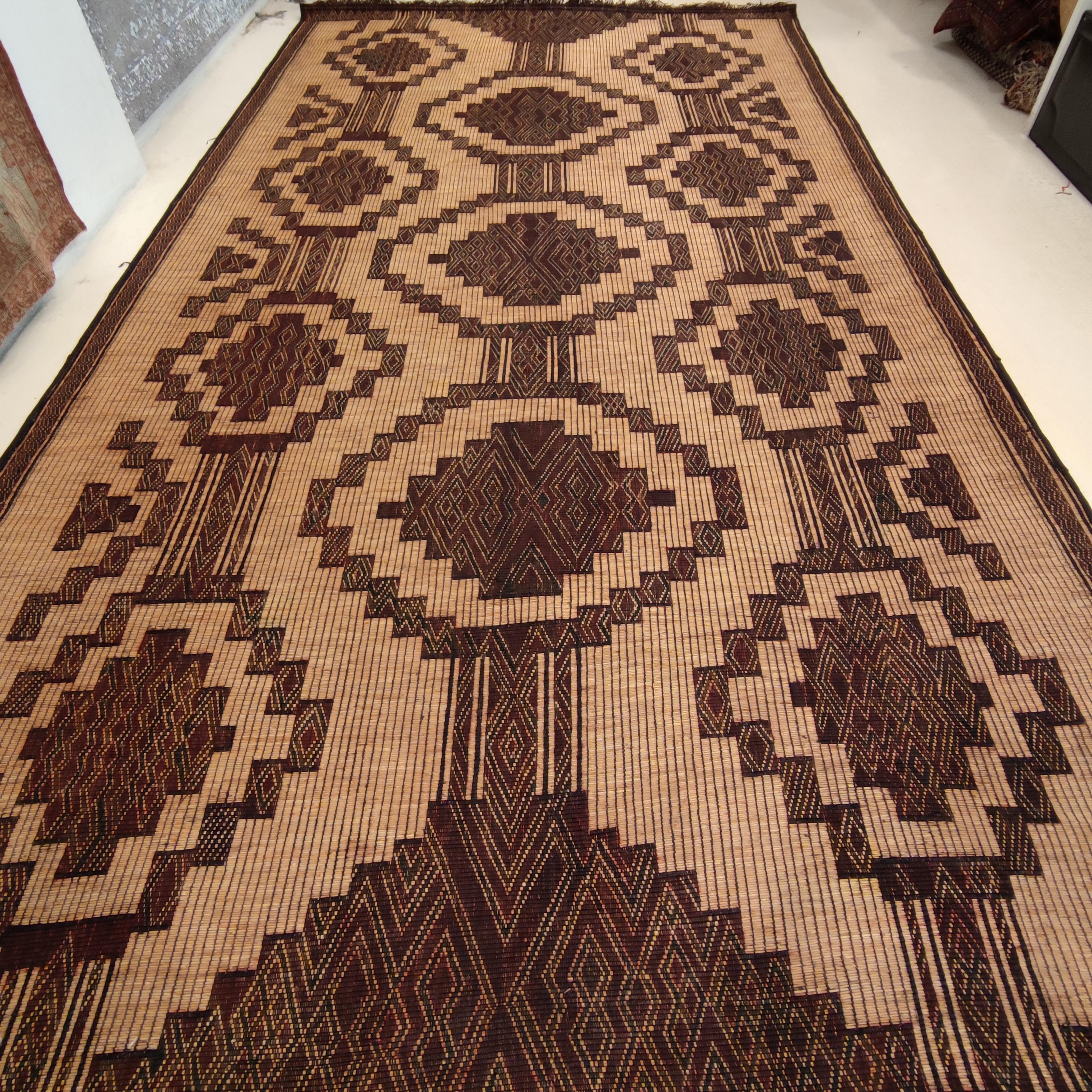 The carpets of the Tuareg, who are cattle herding nomads inhabiting a vast expanse of the Sahara desert, are among the most exciting group of weavings to appear on the market. These are woven by binding together fine straw reeds obtained from the