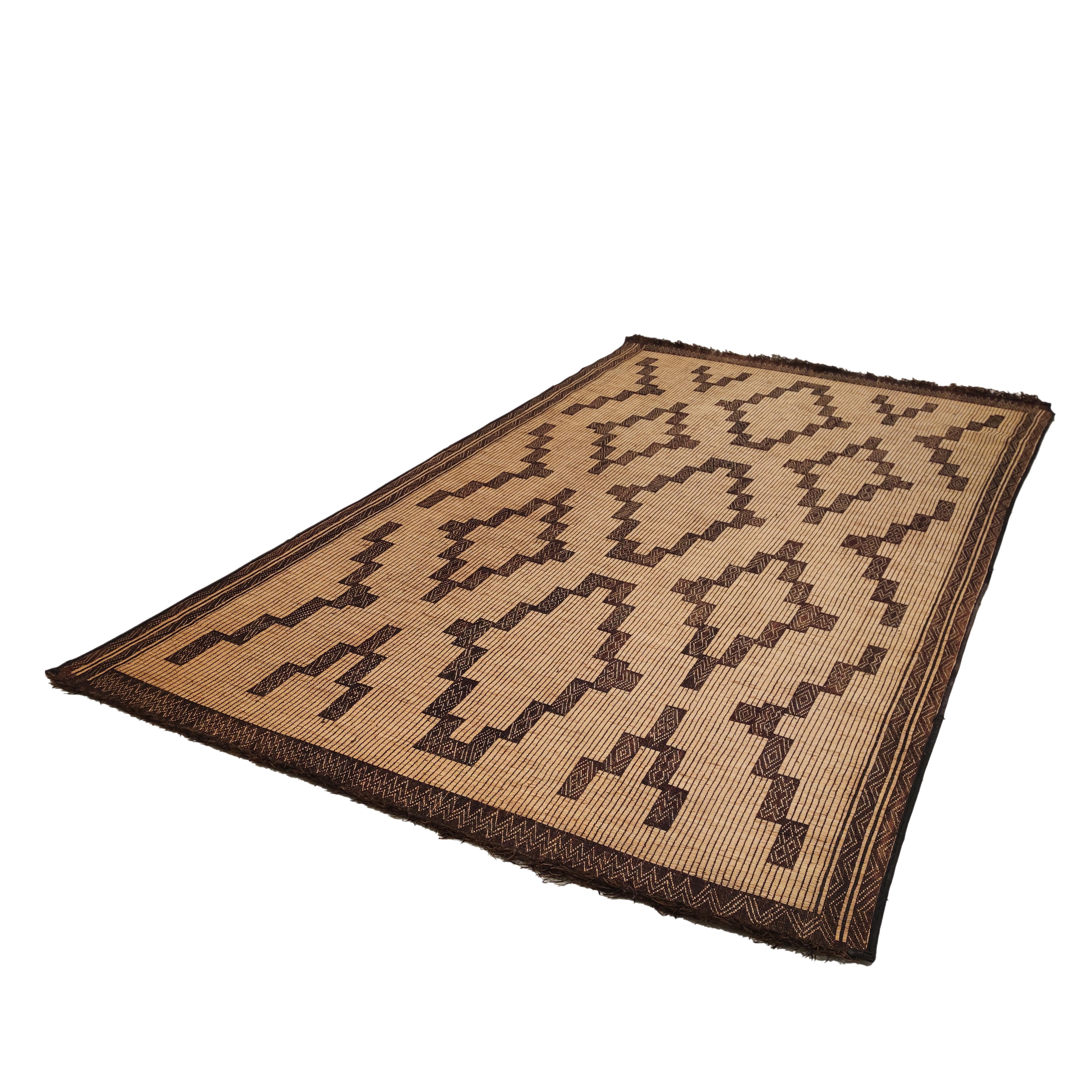 Tribal Vintage Saharan Tuareg Leather and Reed Rug with Geometric Pattern For Sale