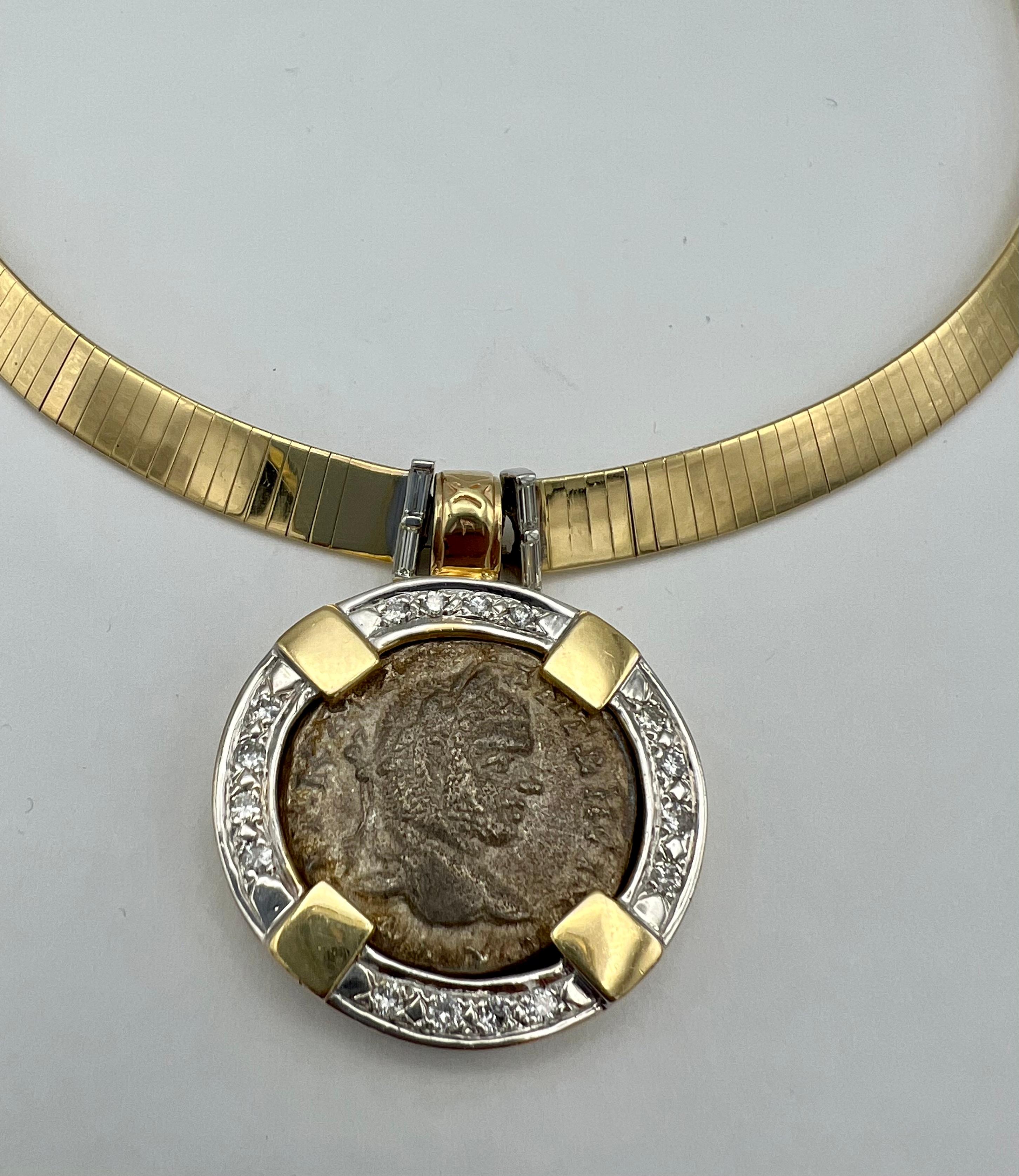 - 14 karat yellow gold
- 1.20 carats of round diamonds 0.40 carat  of baguette diamond
- Ancient cooper coin pendant
- Snake finish necklace
- Box clasp closure with figure 8 safety

Hallmarks: 14K, Italy, SAK
Total weight: 91.8 grams
Measurements: