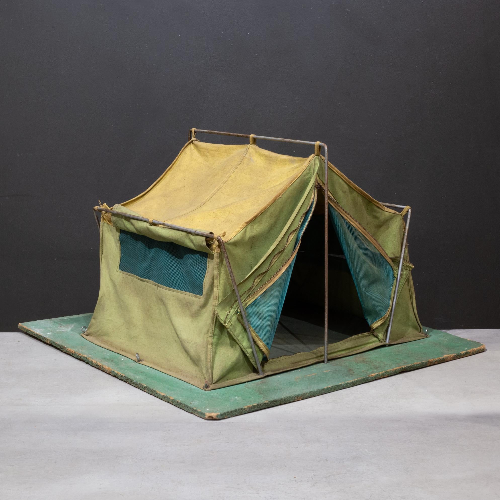 ABOUT

Large vintage salesman’s sample green canvas tent with metal poles, two mesh windows on each side and one large mesh window in the back. Large mesh doors in front that zip close. Canvas flaps on each side and canvas doors in the front that