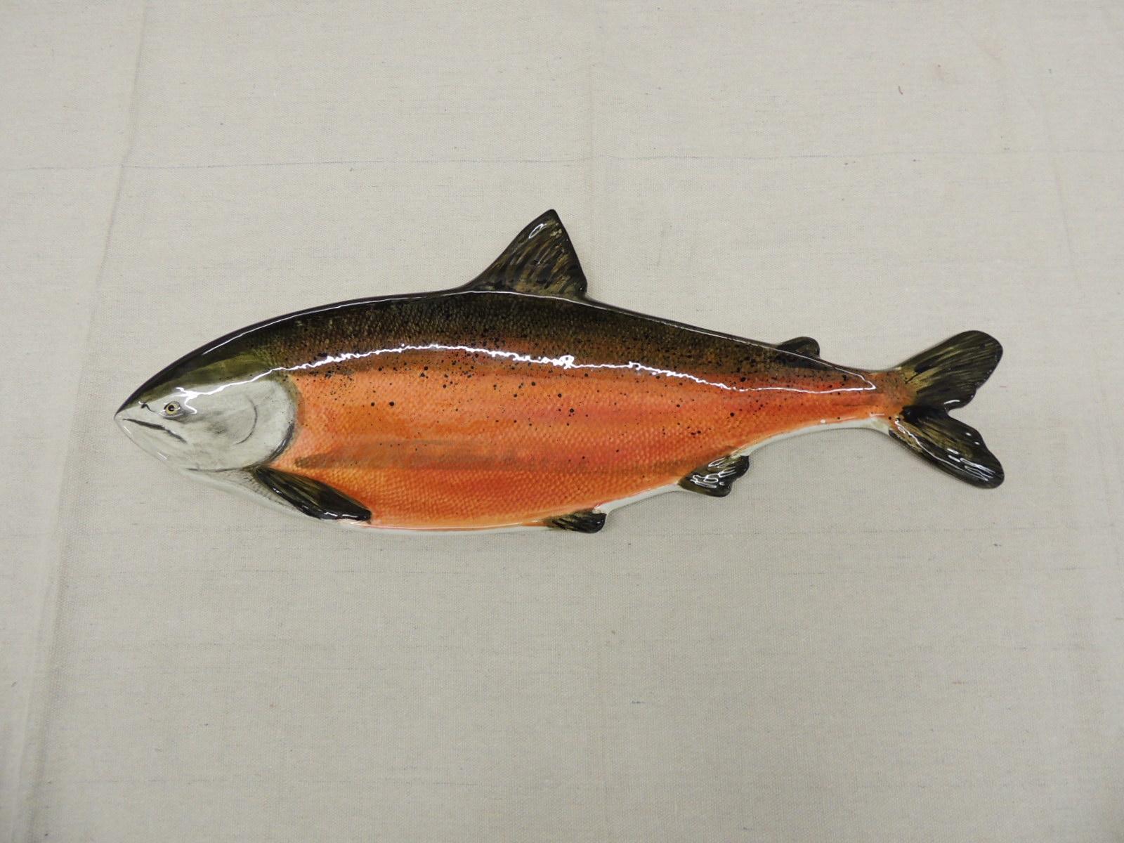 Vintage Salmon serving decorative platter
Signed: CA July 10, 2004
Made in the USA
Signed and numbered by the craftsman
A wild spawning Coho Salmon
Ceramic. Dishwasher safe and for decorative purposes only.