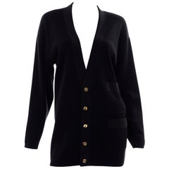 Salvatore Ferragamo, Cardigan vintage en laine mérinos, noir à boutons bicolores