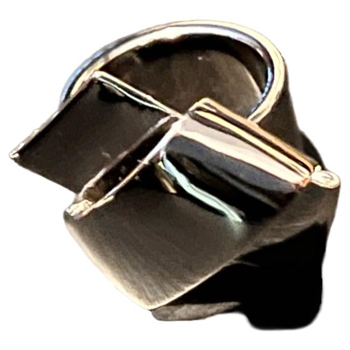 Vintage Salvatore Ferragamo Silver Twist Ring. 
A unique and beautiful piece of statement jewellery from this iconic Italian brand. 
Comes with original box. A perfect gift idea. 
Size small.
Made in Italy.