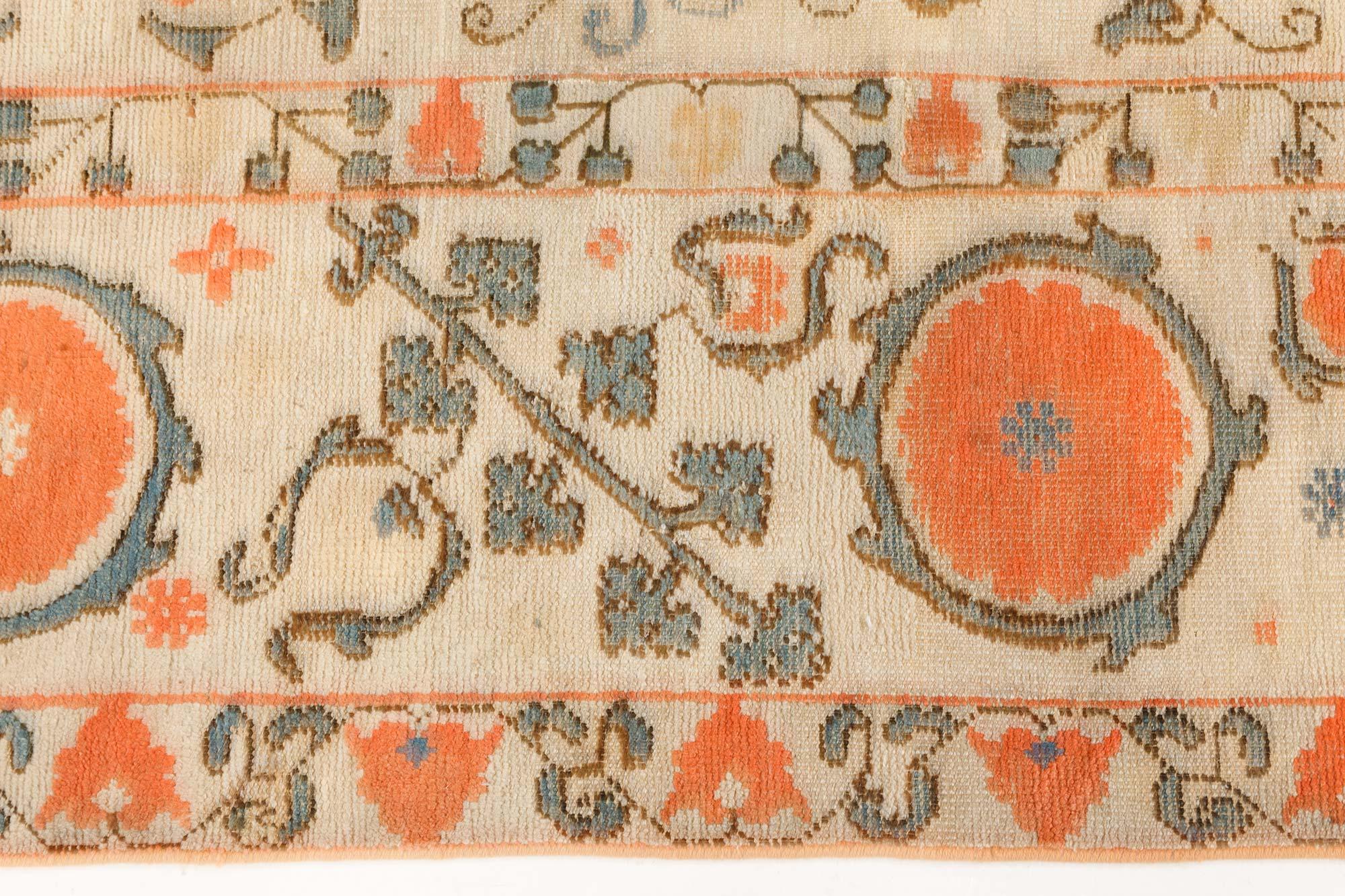 Vintage Samarkand 'Khotan' Orange Handmade Wool Carpet.
Size: 5'3