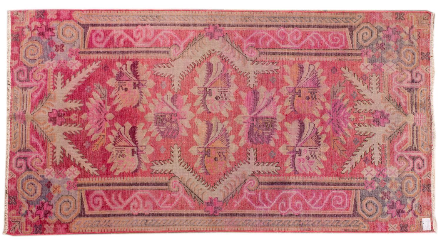 Cheerful pink color for this old Samarkand carpet, like a flowered garden, soft and pleasant to the touch - Samarkand: the famous town 