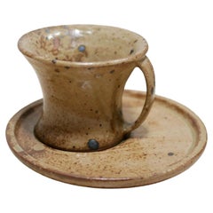 Vintage sandstone cup and saucer