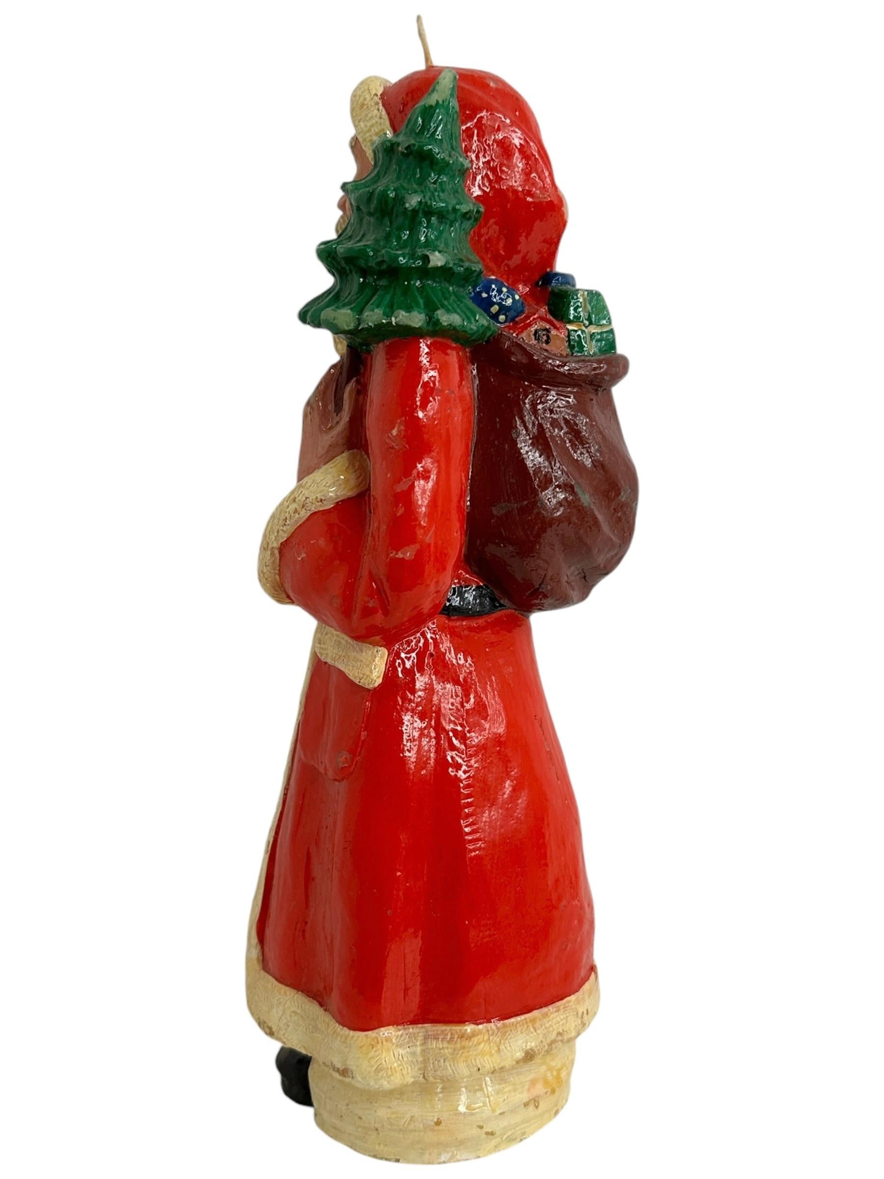 A beautiful German Belsnickle / Santa Claus Candle. Was probably made before World War two in Germany. Scattered wear due to age. It is made of wax and is hand-painted. Nice addition to your Christmas collection or decoration. As mentioned before we