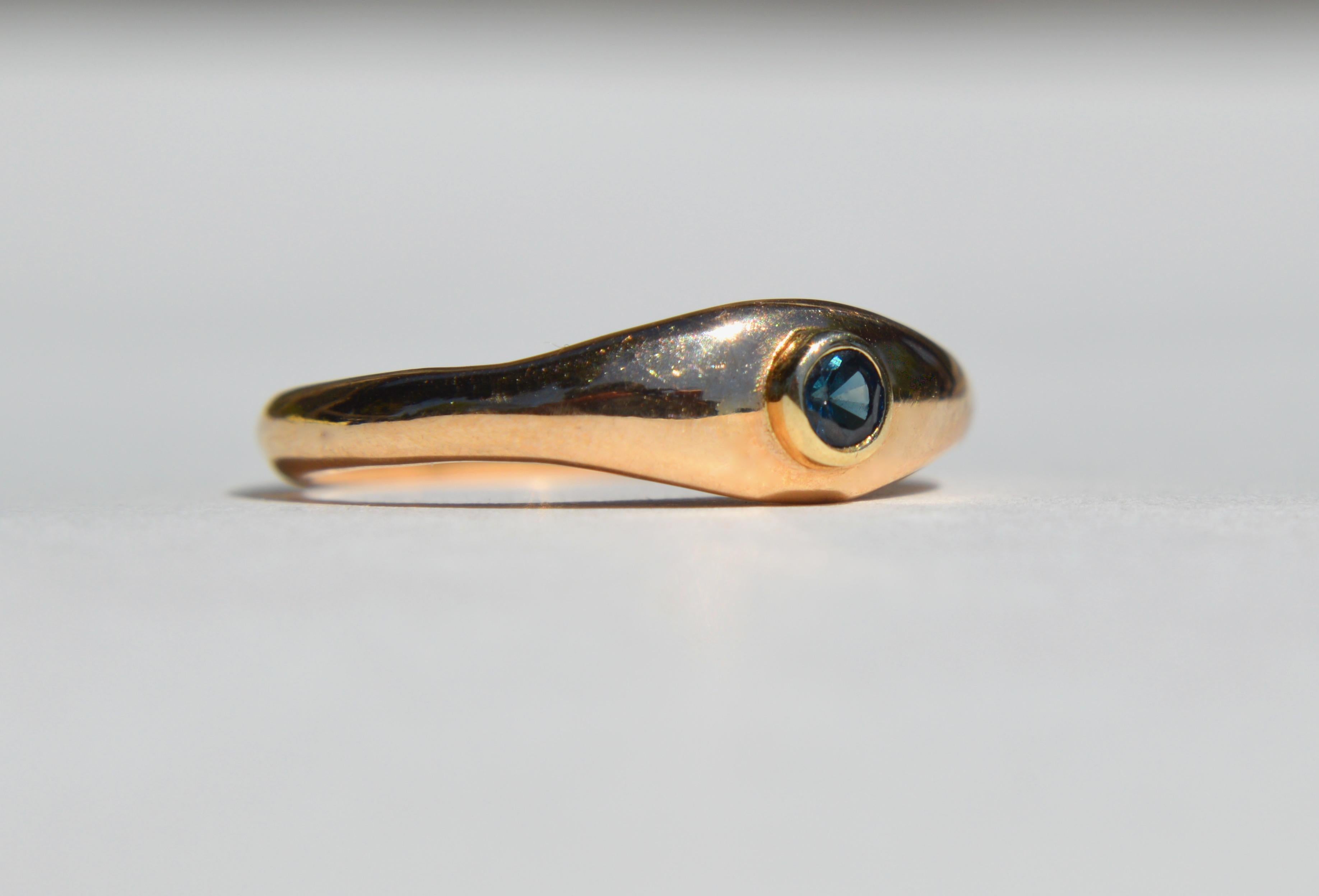 Beautiful Midcentury era circa 1960s .11 carat natural deep blue Ceylon sapphire and diamond ring in solid 14K yellow gold with a bezel setting. Gold is unmarked, but tested as solid 14K gold. Size 6.25 and resizable. Sapphire measures 3mm in