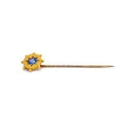 Alfiler vintage de zafiro con estrella engastada en oro amarillo de 18 quilates, circa 1950