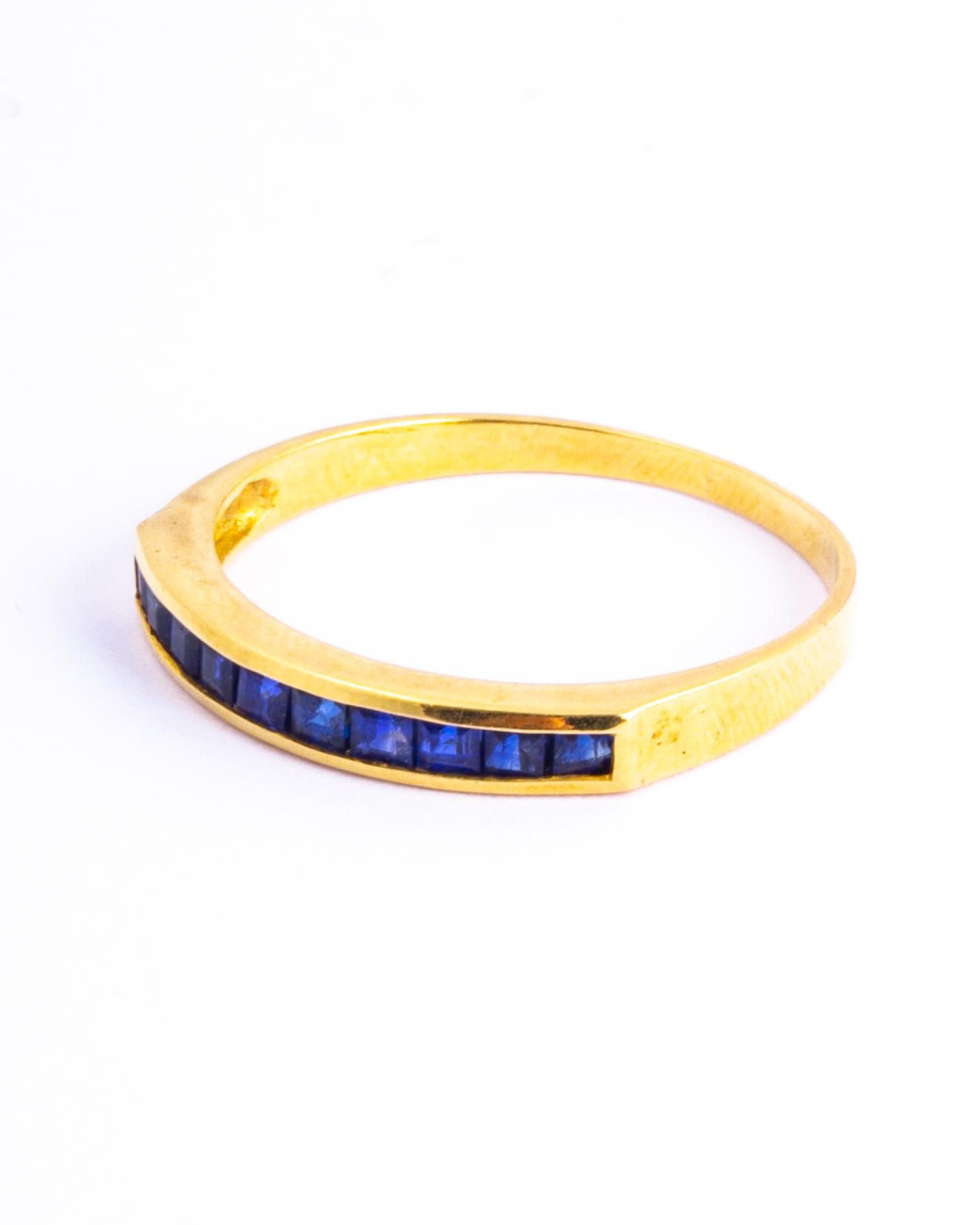 The sapphire set within this 9ct gold band are square cut and total approx 50pts. They have a great shine to them and are beautifully bright stones. 

Ring Size: N or 6 3/4 
Band Width: 2.5mm 

Weight: 1.62g