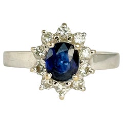 Cluster vintage di zaffiri e diamanti in oro 18 carati