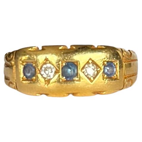 Vintage Sapphire and Diamond 18 Carat Gold Five Stone Band For Sale