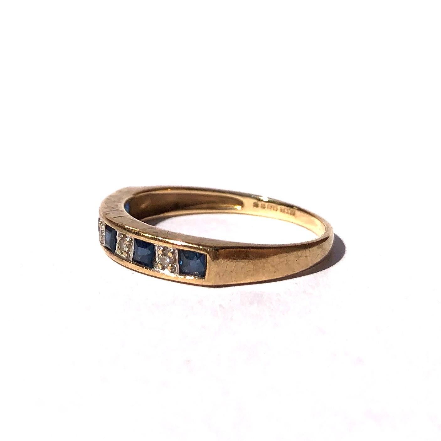 Set within this 18ct gold band there are five deep blue sapphires and four sparking diamonds. The sapphires are square cut and measure 10pts each. 

Ring Size: N or 6 3/4
Band Width: 3mm

Weight: 1.7g 