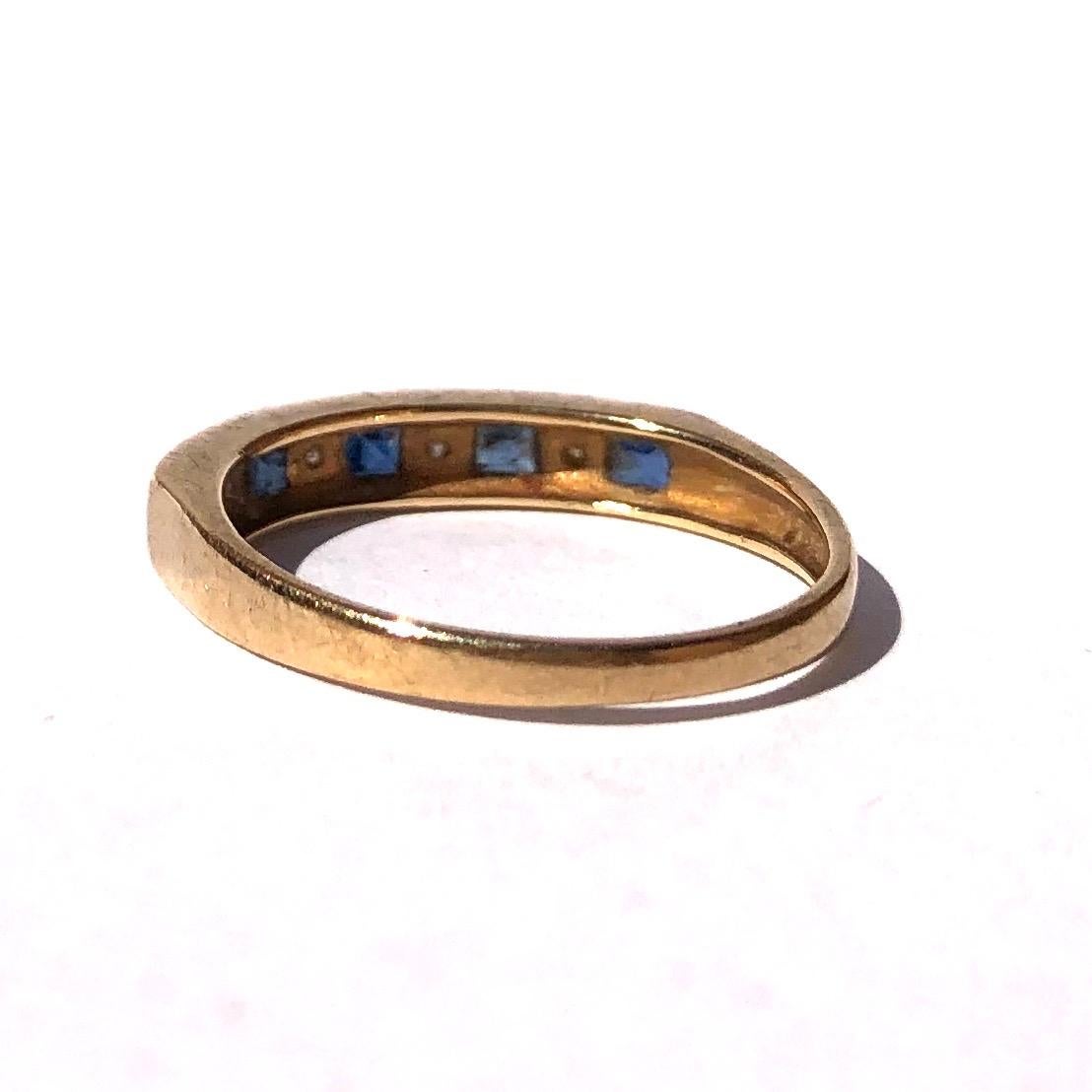 gold and sapphire eternity ring